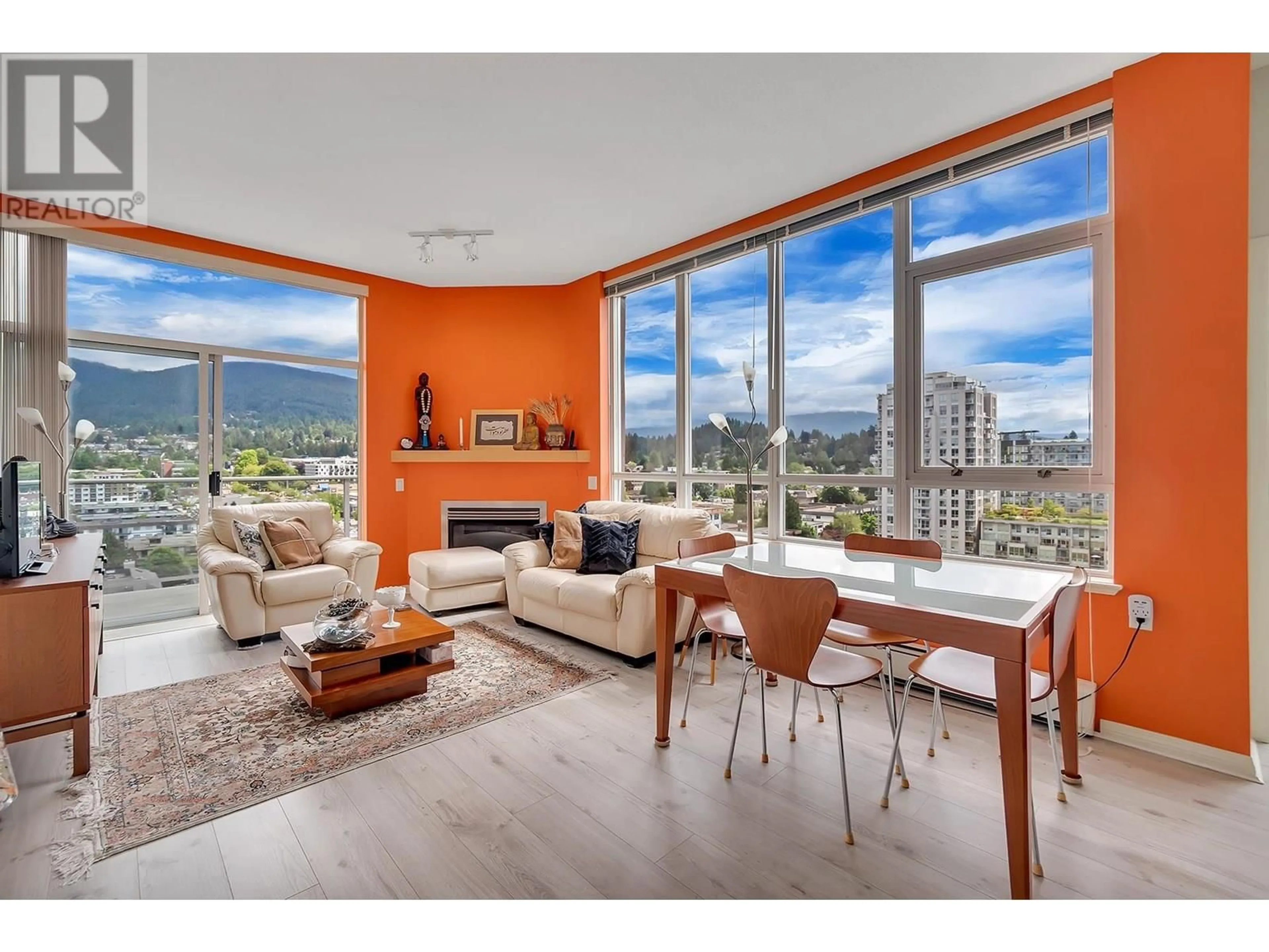 Living room with furniture, wood/laminate floor for 1403 - 120 16TH STREET, North Vancouver British Columbia V7M3N6