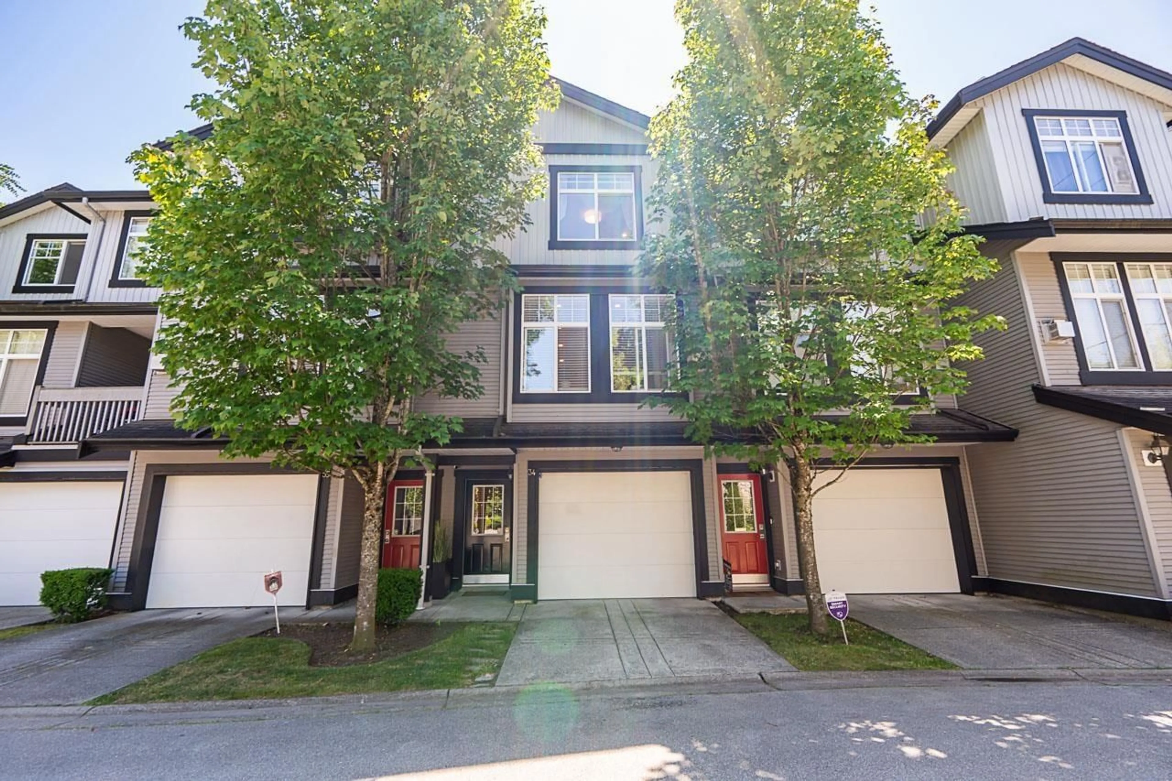 A pic from outside/outdoor area/front of a property/back of a property/a pic from drone, street for 34 - 18828 69, Surrey British Columbia V4N5L1