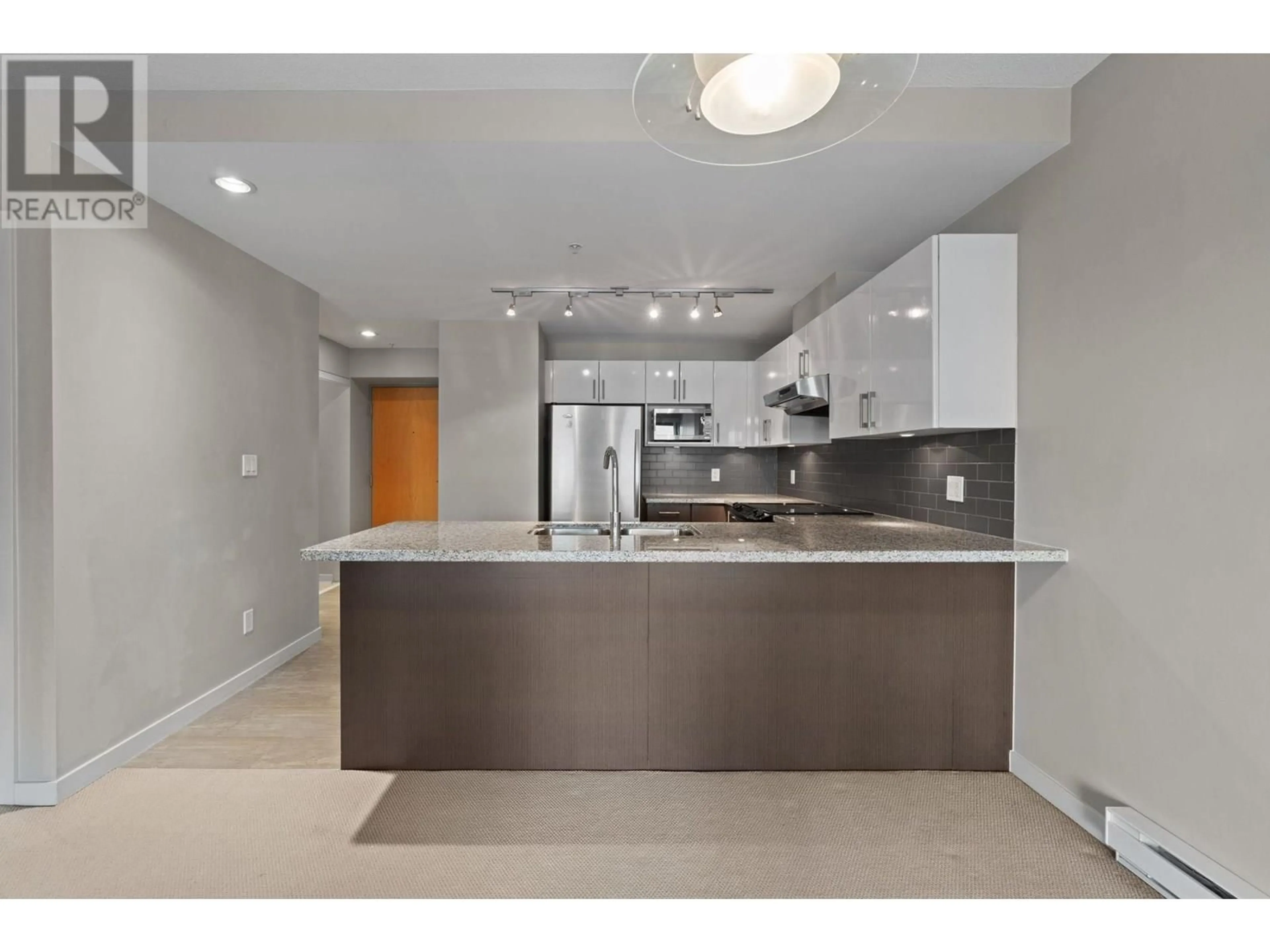Open concept kitchen, unknown for 606 - 14 BEGBIE STREET, New Westminster British Columbia V3M0C4