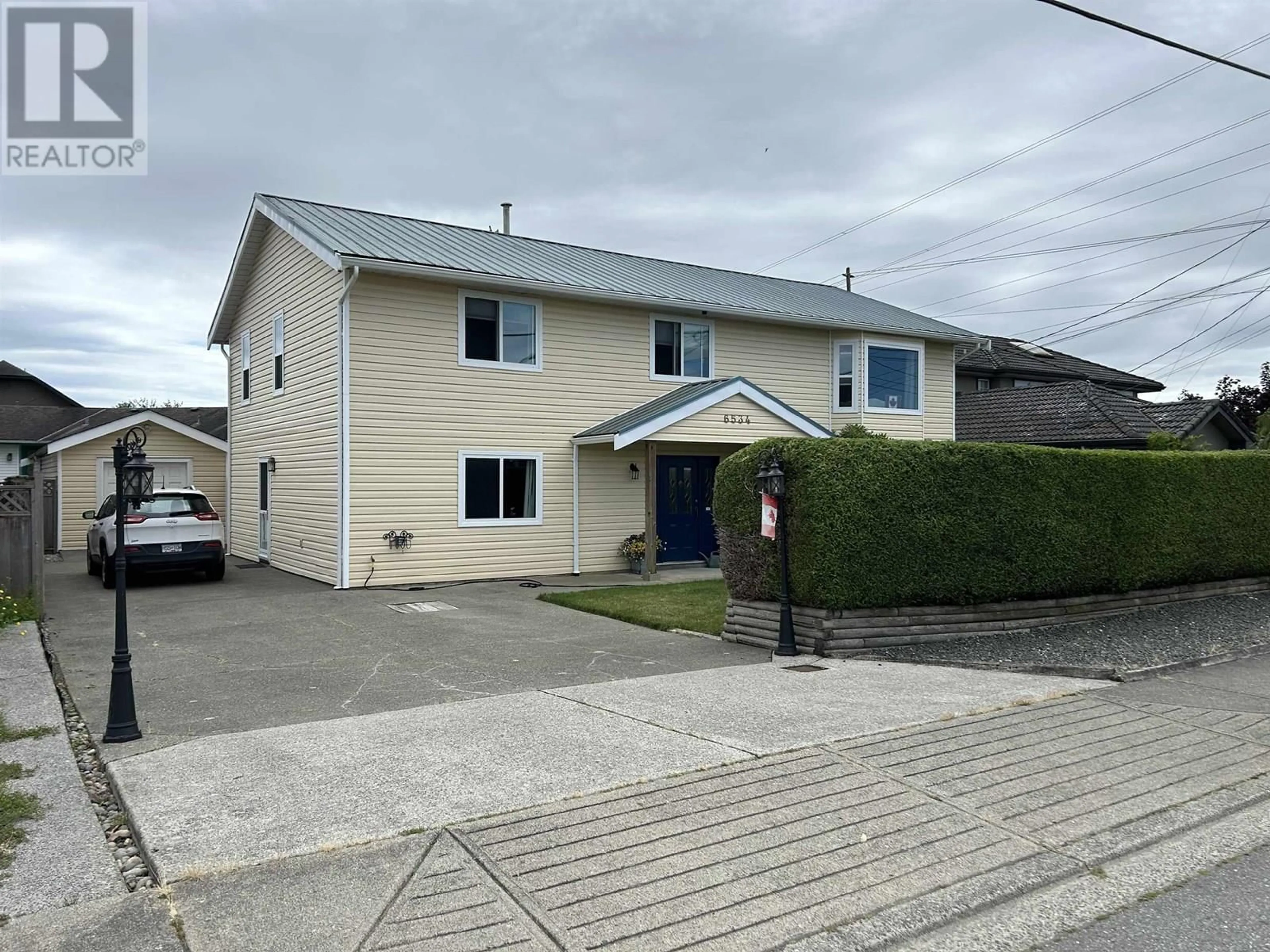 A pic from outside/outdoor area/front of a property/back of a property/a pic from drone, street for 6534 HOLLY PARK DRIVE, Delta British Columbia V4K4Y7