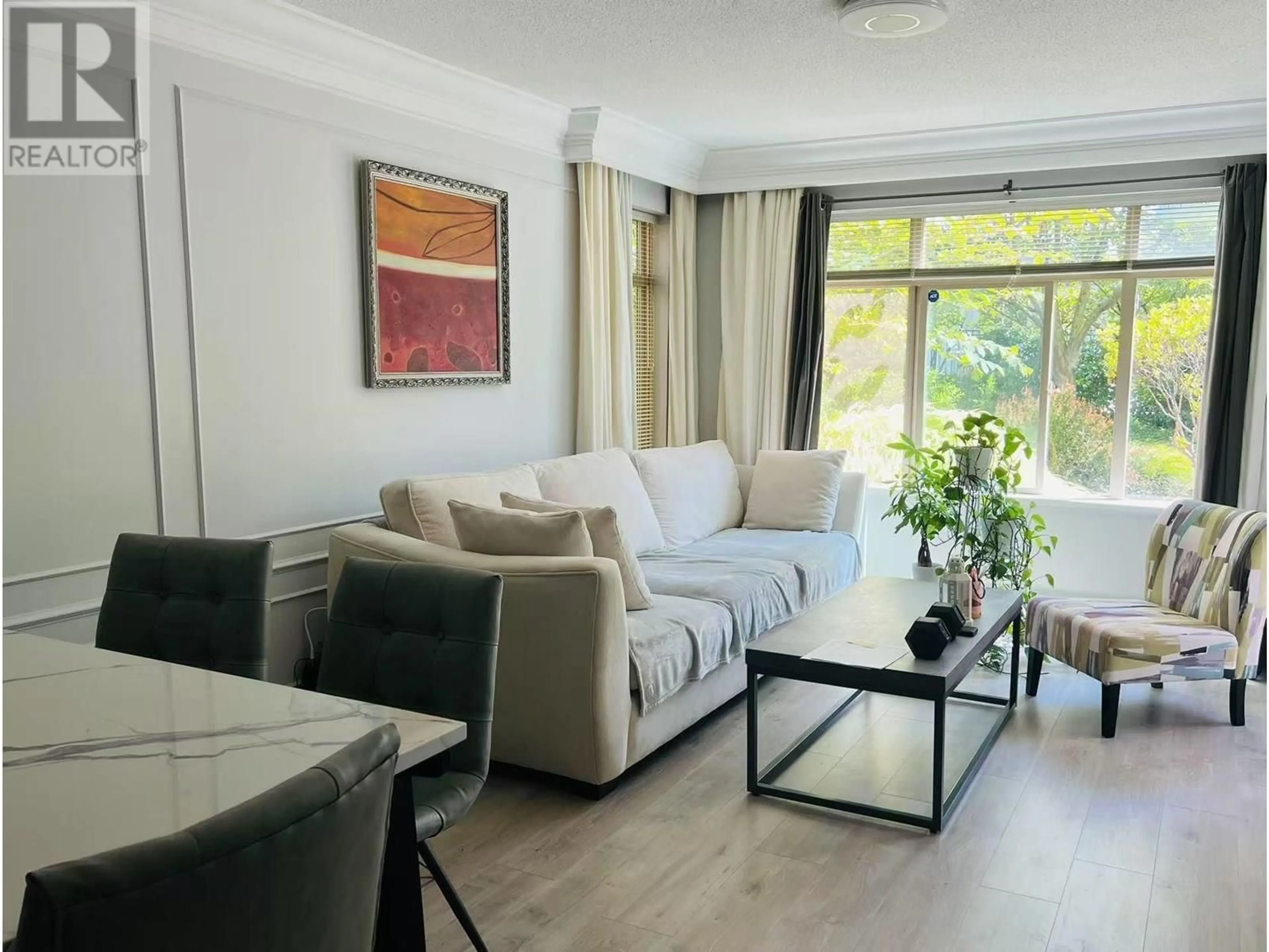 Living room with furniture, unknown for 116 - 9288 ODLIN ROAD, Richmond British Columbia V6X0C3