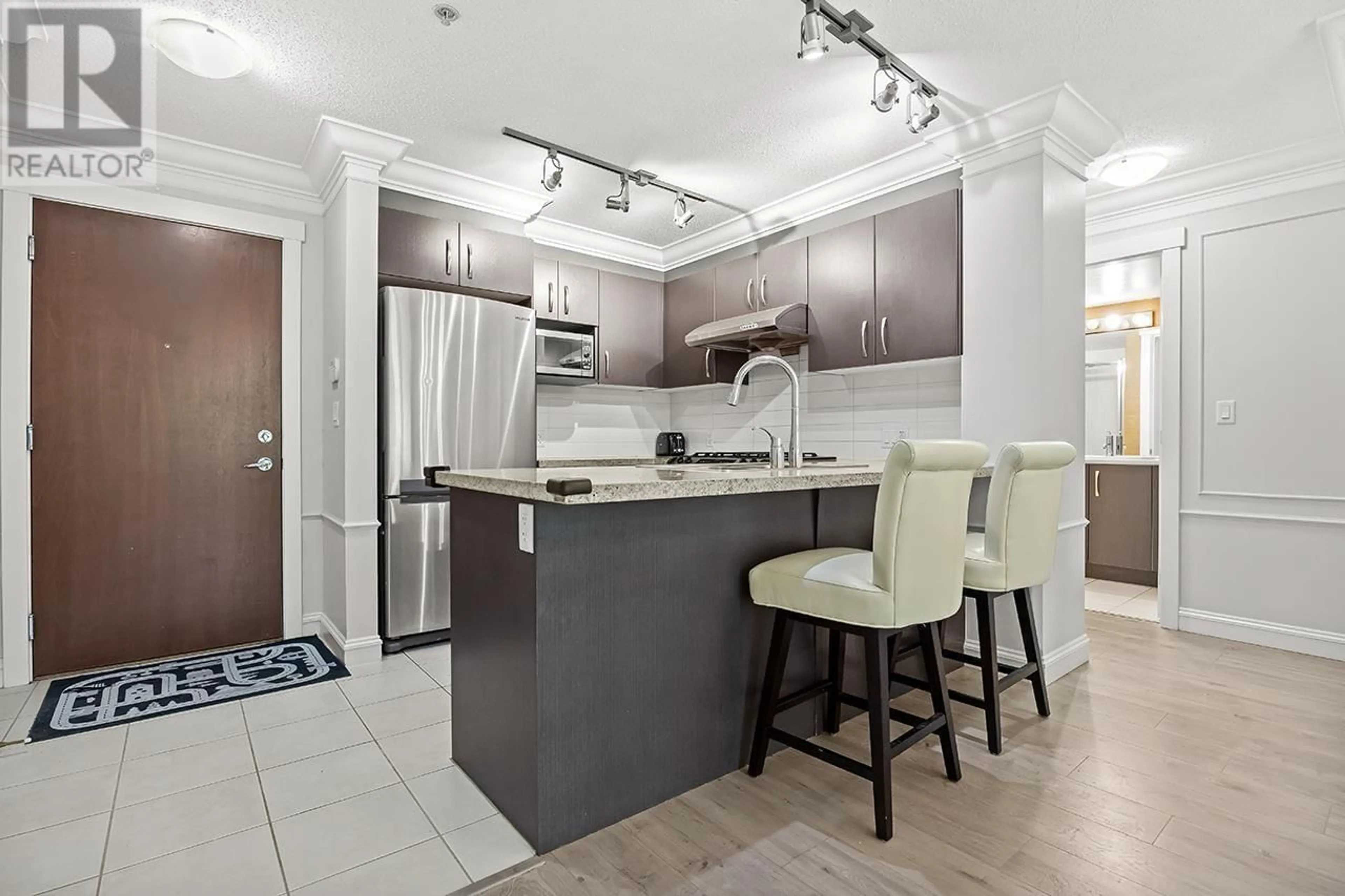 Open concept kitchen, unknown for 116 - 9288 ODLIN ROAD, Richmond British Columbia V6X0C3