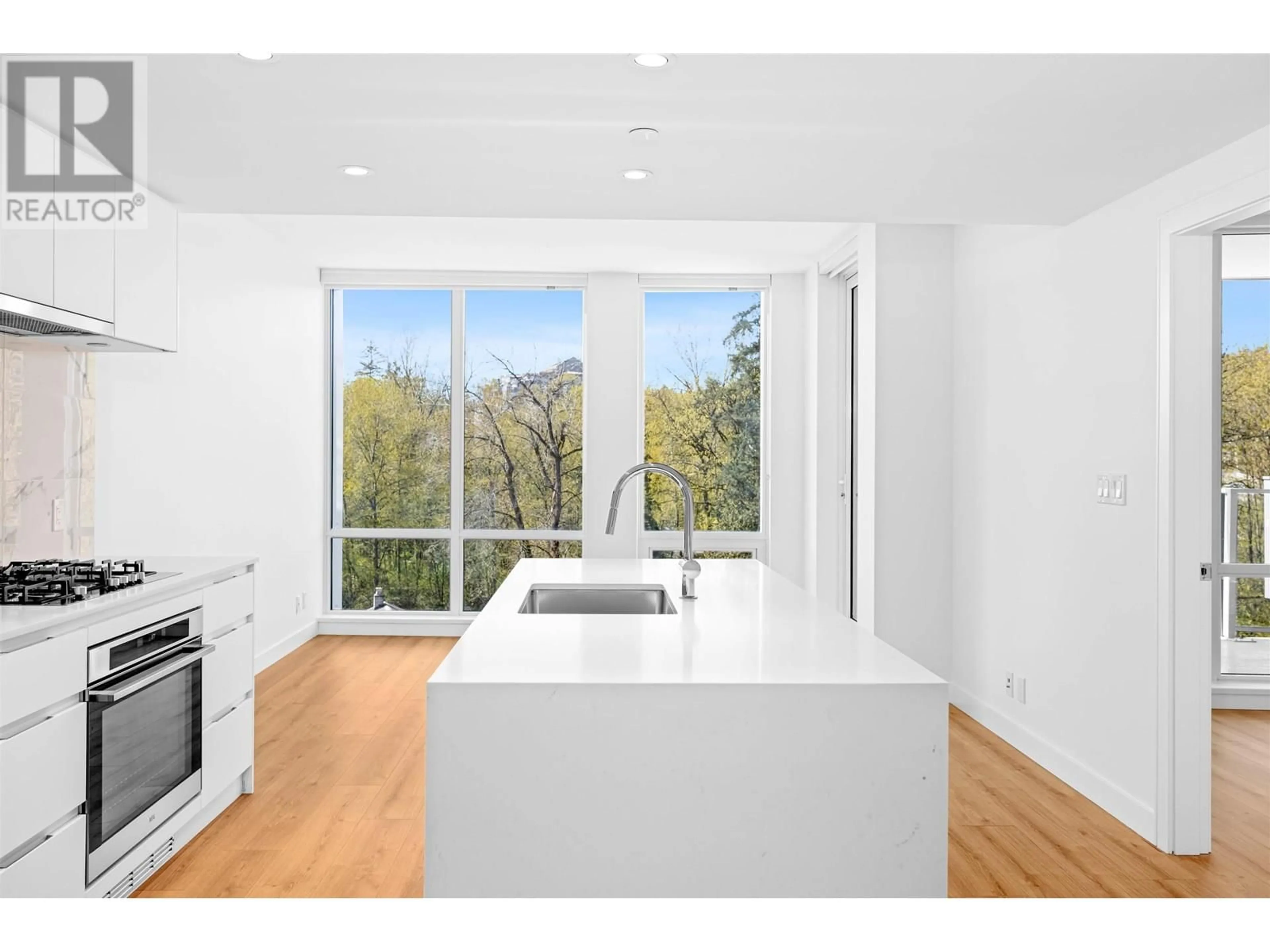 Open concept kitchen, unknown for 618 - 1500 FERN STREET, North Vancouver British Columbia V7J0E6