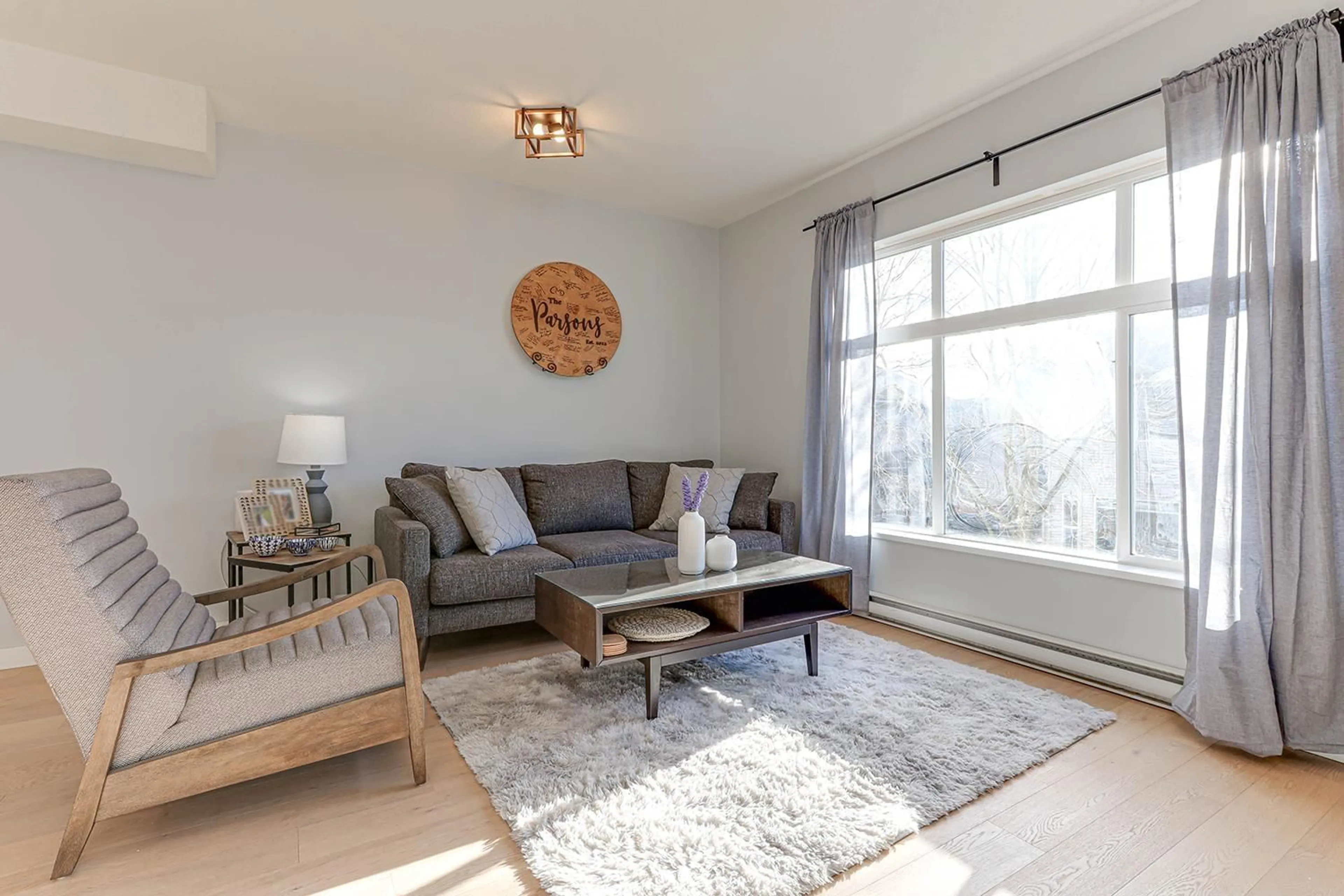 Living room with furniture, wood/laminate floor for 78 - 7179 201, Langley British Columbia V2Y2Y9