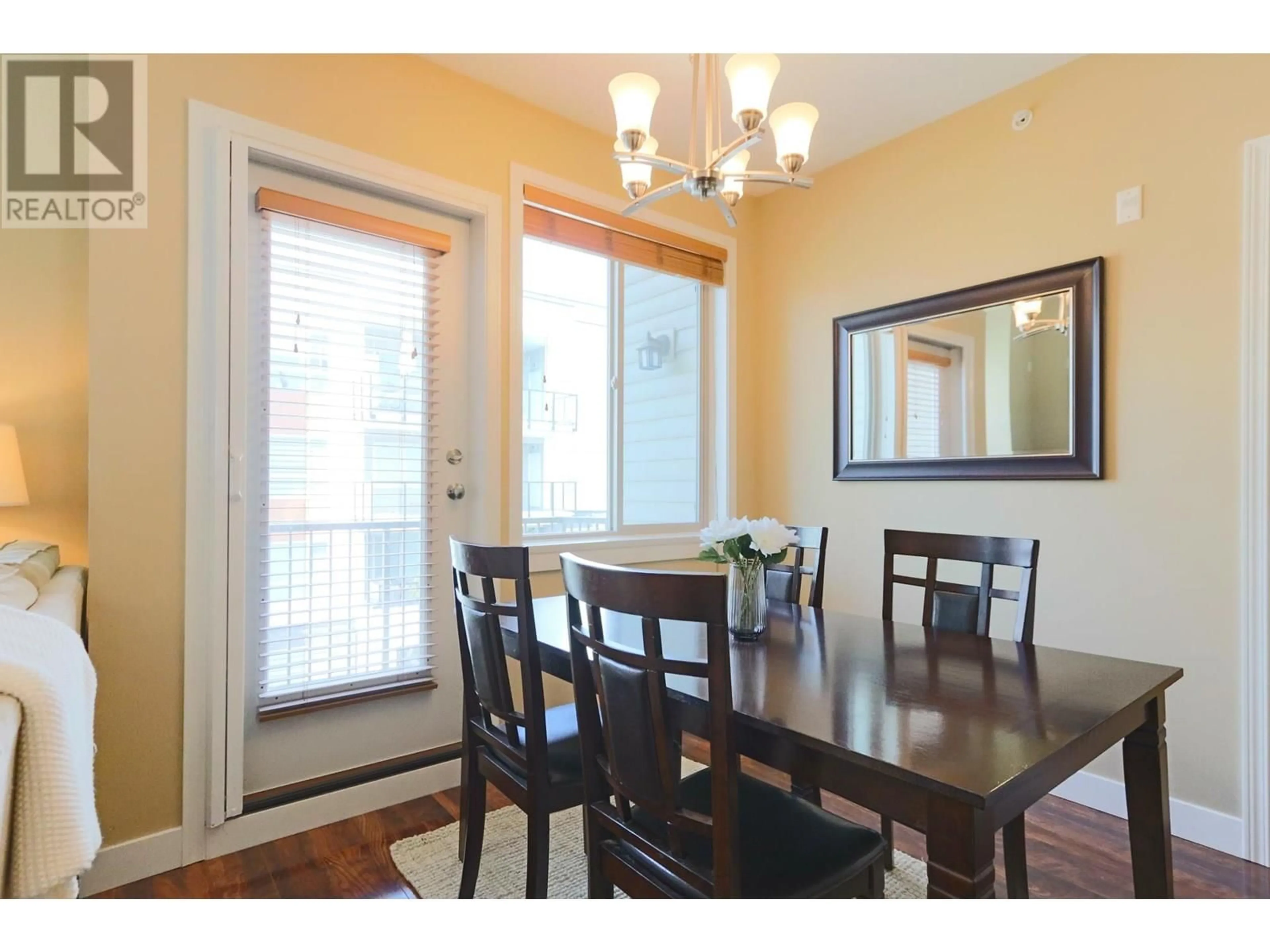Dining room, wood/laminate floor for 413 - 11887 BURNETT STREET, Maple Ridge British Columbia V2X6P6
