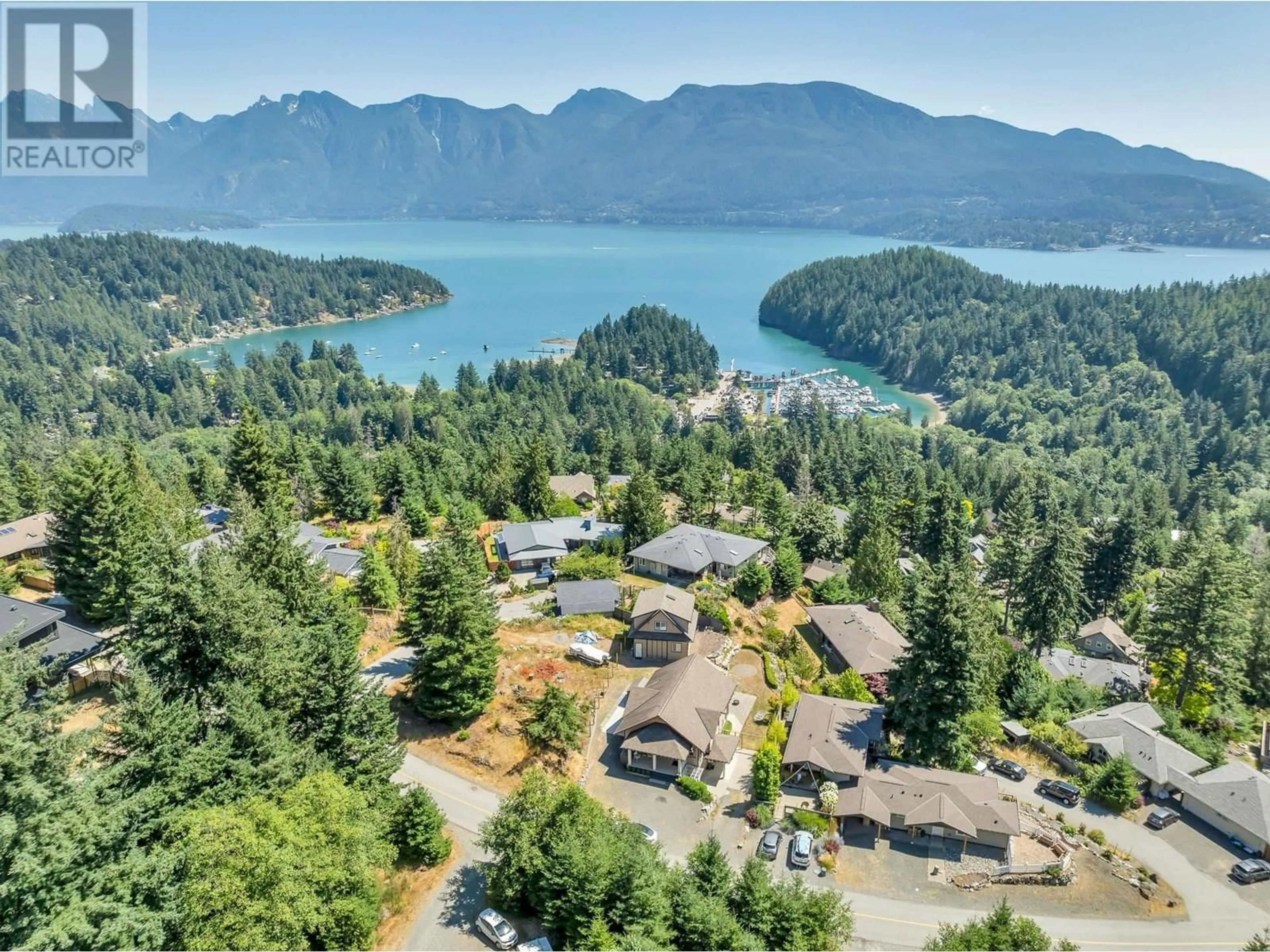 A pic from outside/outdoor area/front of a property/back of a property/a pic from drone, water/lake/river/ocean view for 931 RIVENDELL DRIVE, Bowen Island British Columbia V0N1G1