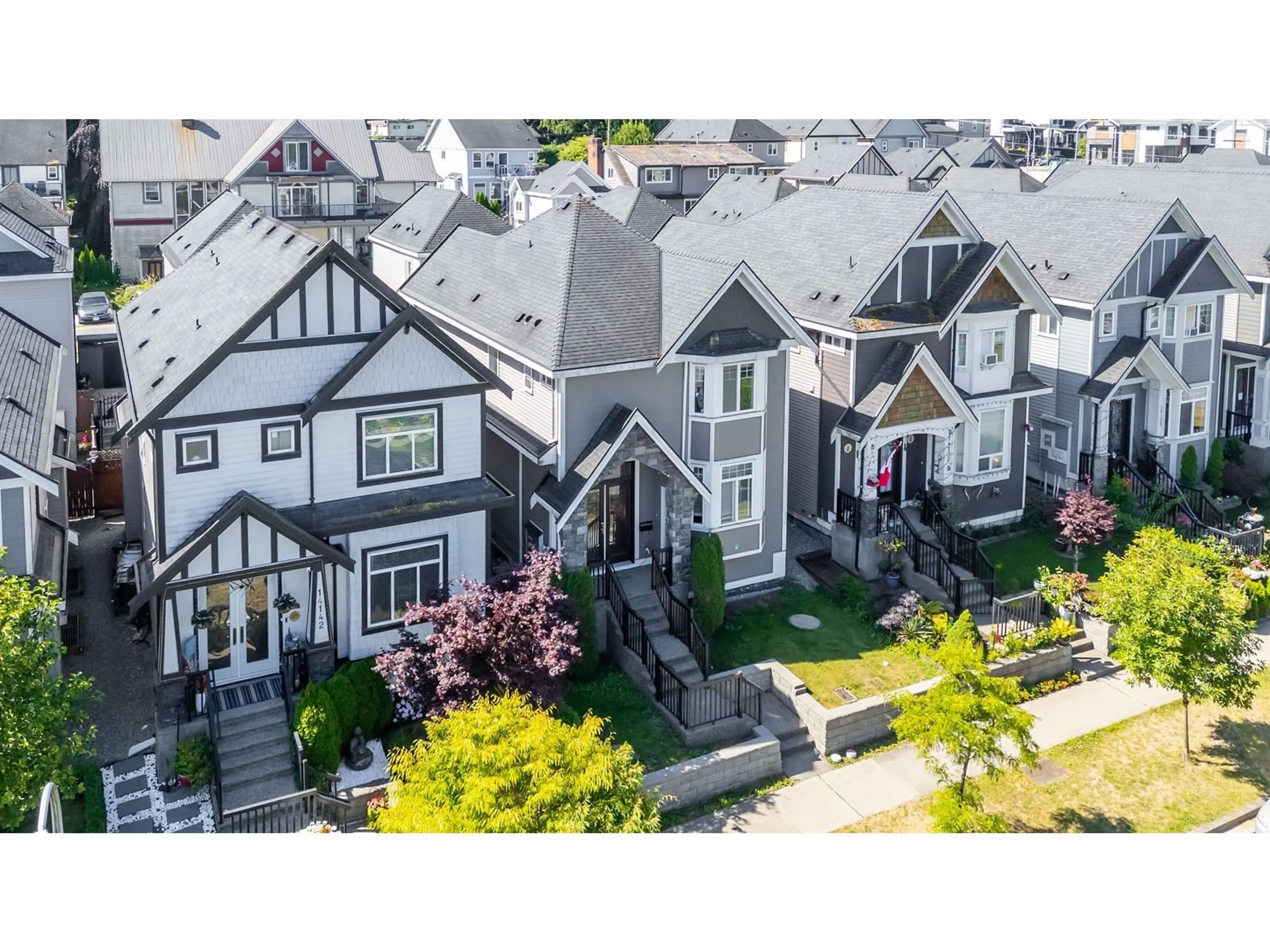 A pic from outside/outdoor area/front of a property/back of a property/a pic from drone, street for 14138 60A, Surrey British Columbia V3X0G1
