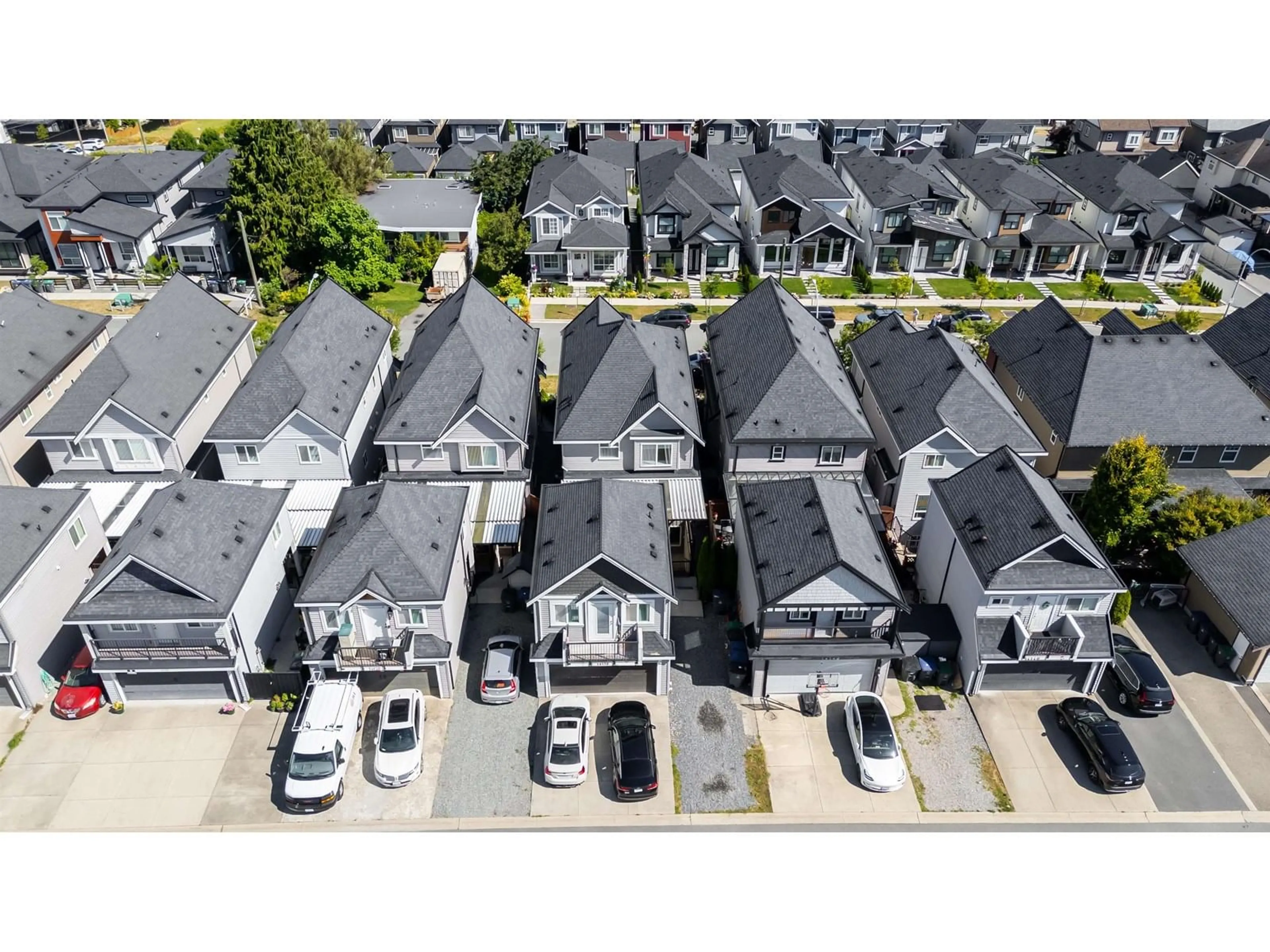 A pic from outside/outdoor area/front of a property/back of a property/a pic from drone, street for 14138 60A, Surrey British Columbia V3X0G1