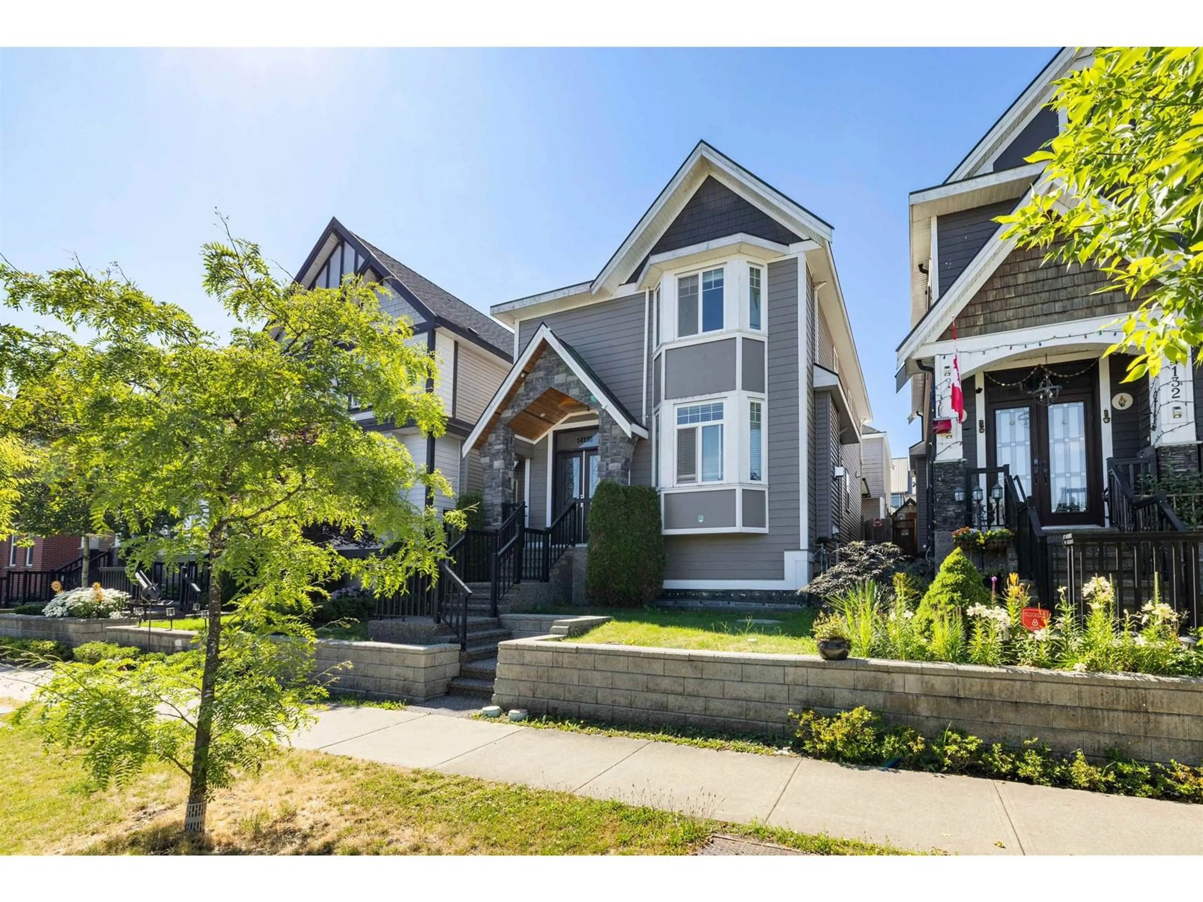 Home with vinyl exterior material, street for 14138 60A, Surrey British Columbia V3X0G1