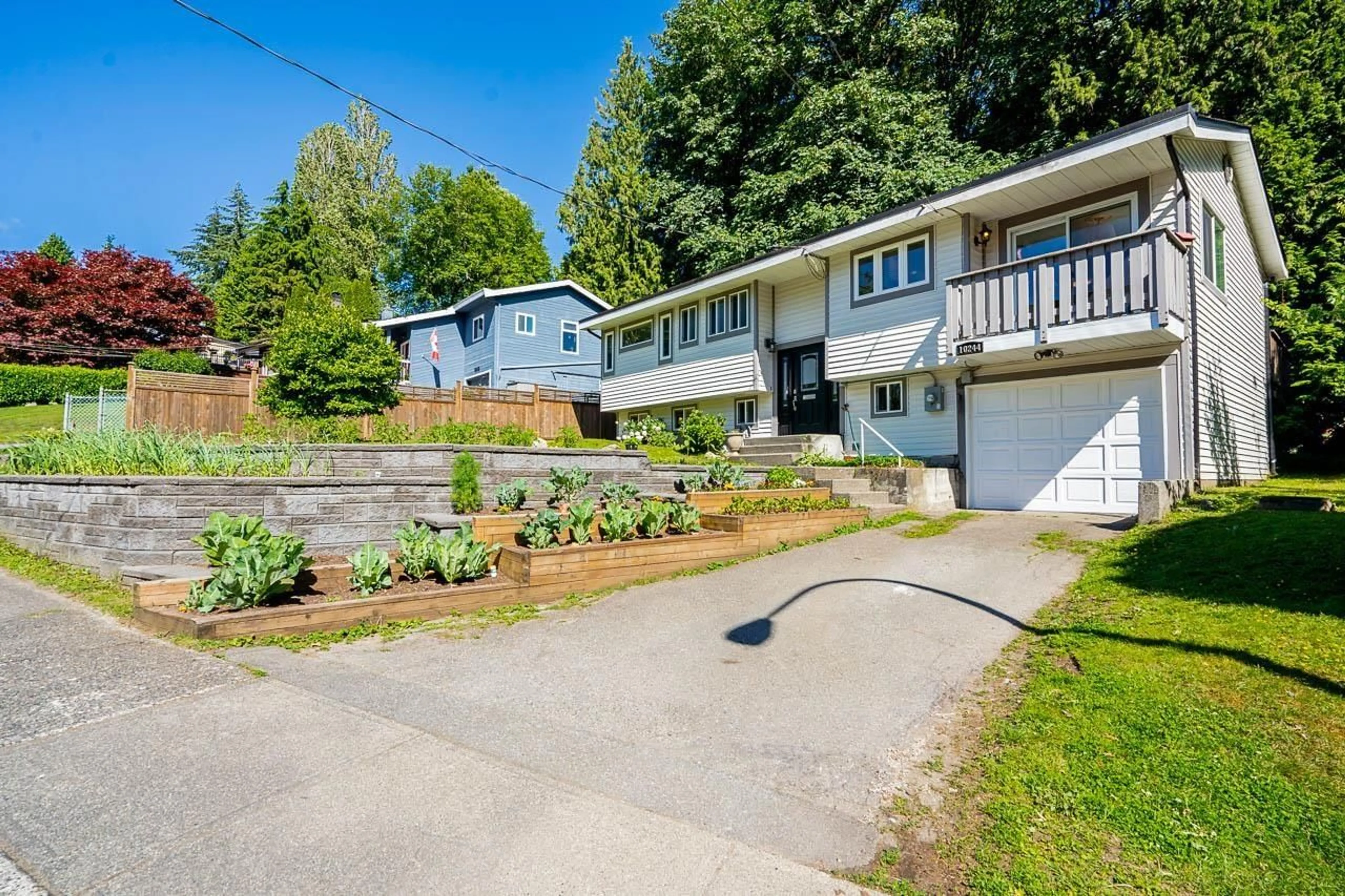 A pic from outside/outdoor area/front of a property/back of a property/a pic from drone, street for 10244 MAIN, Delta British Columbia V4C7H3