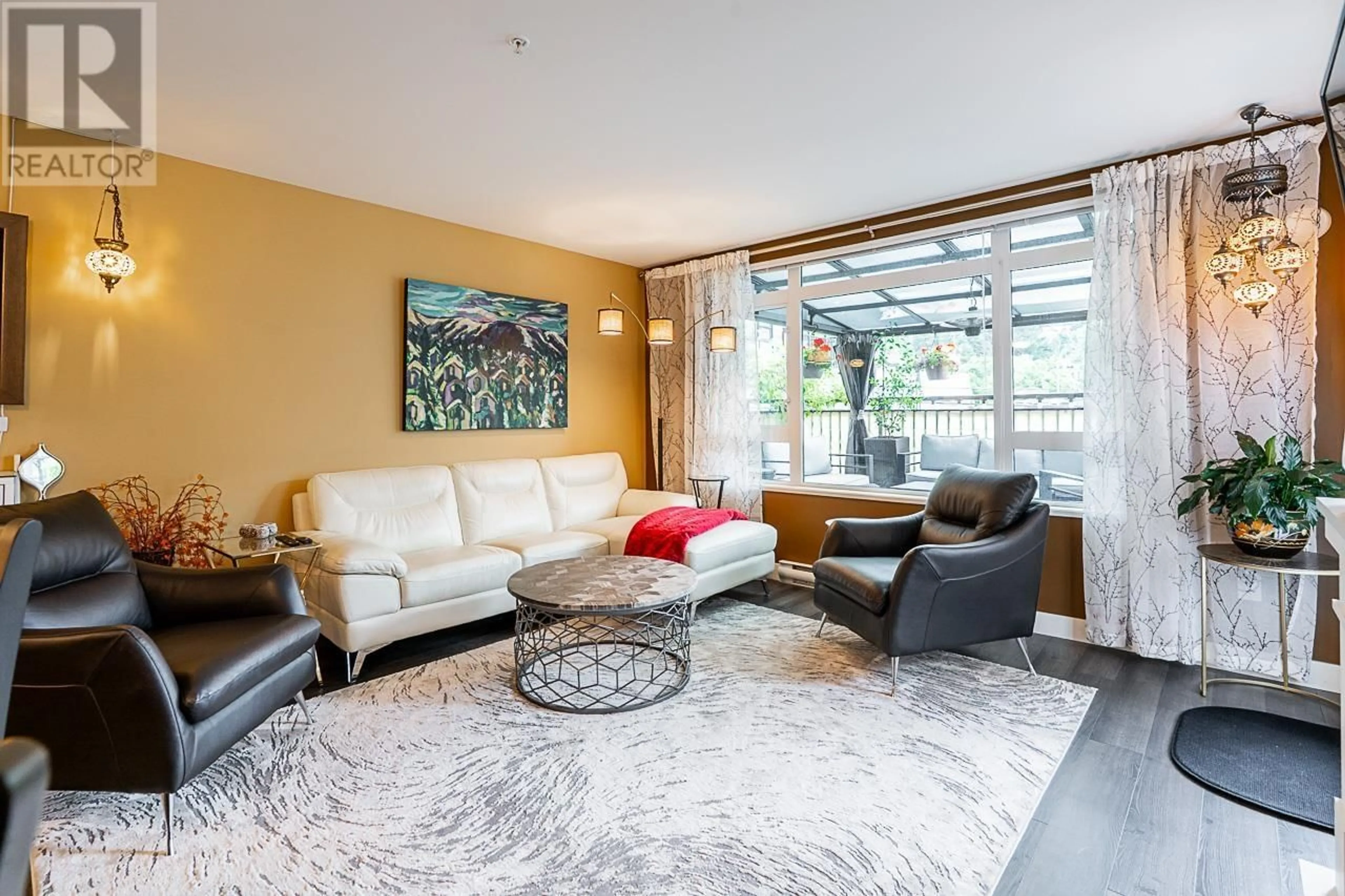 Living room with furniture, unknown for 221 - 2525 CLARKE STREET, Port Moody British Columbia V3H0J3