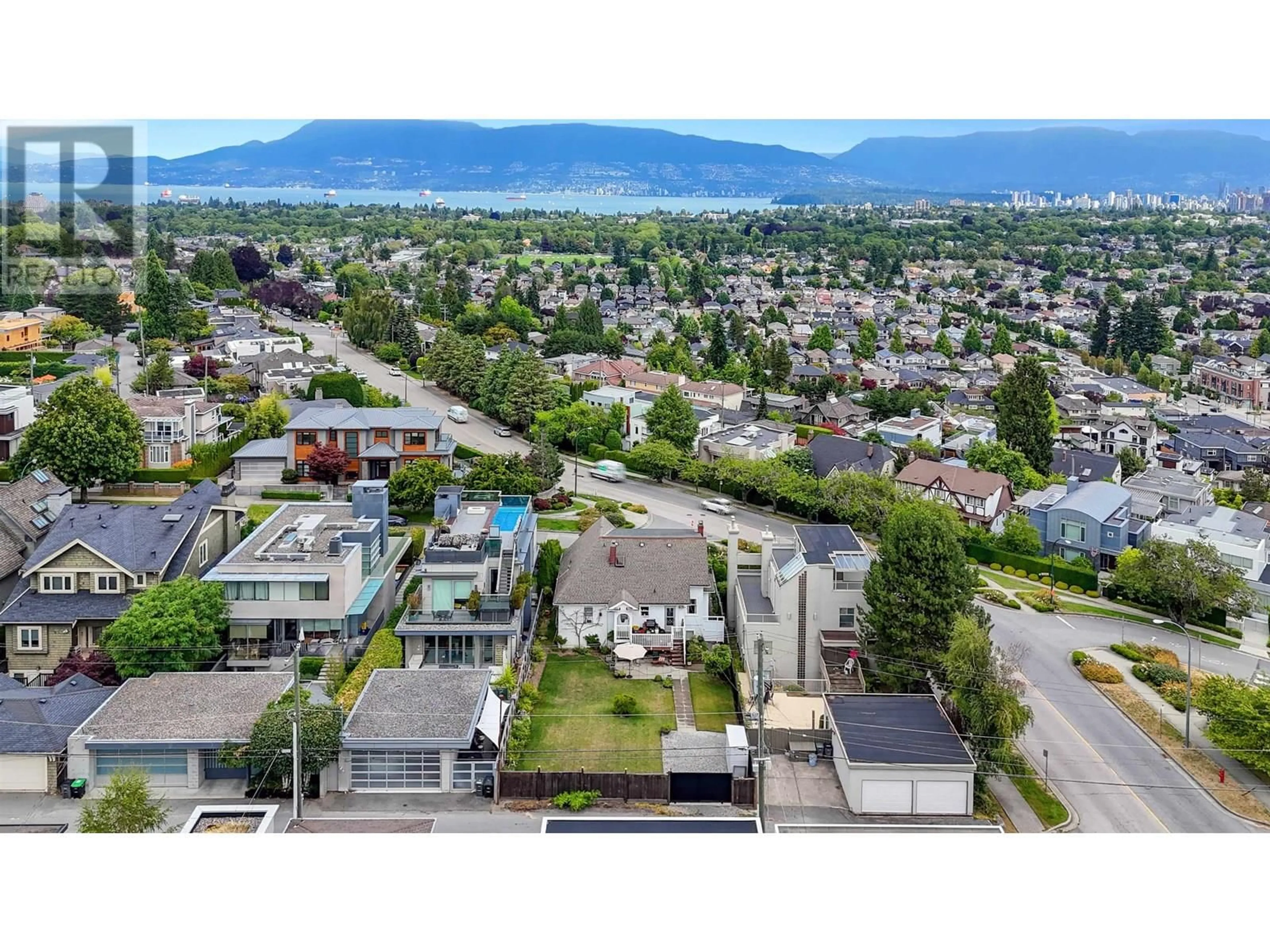 A pic from outside/outdoor area/front of a property/back of a property/a pic from drone, mountain view for 2912 27TH AVENUE, Vancouver British Columbia V6L1W3