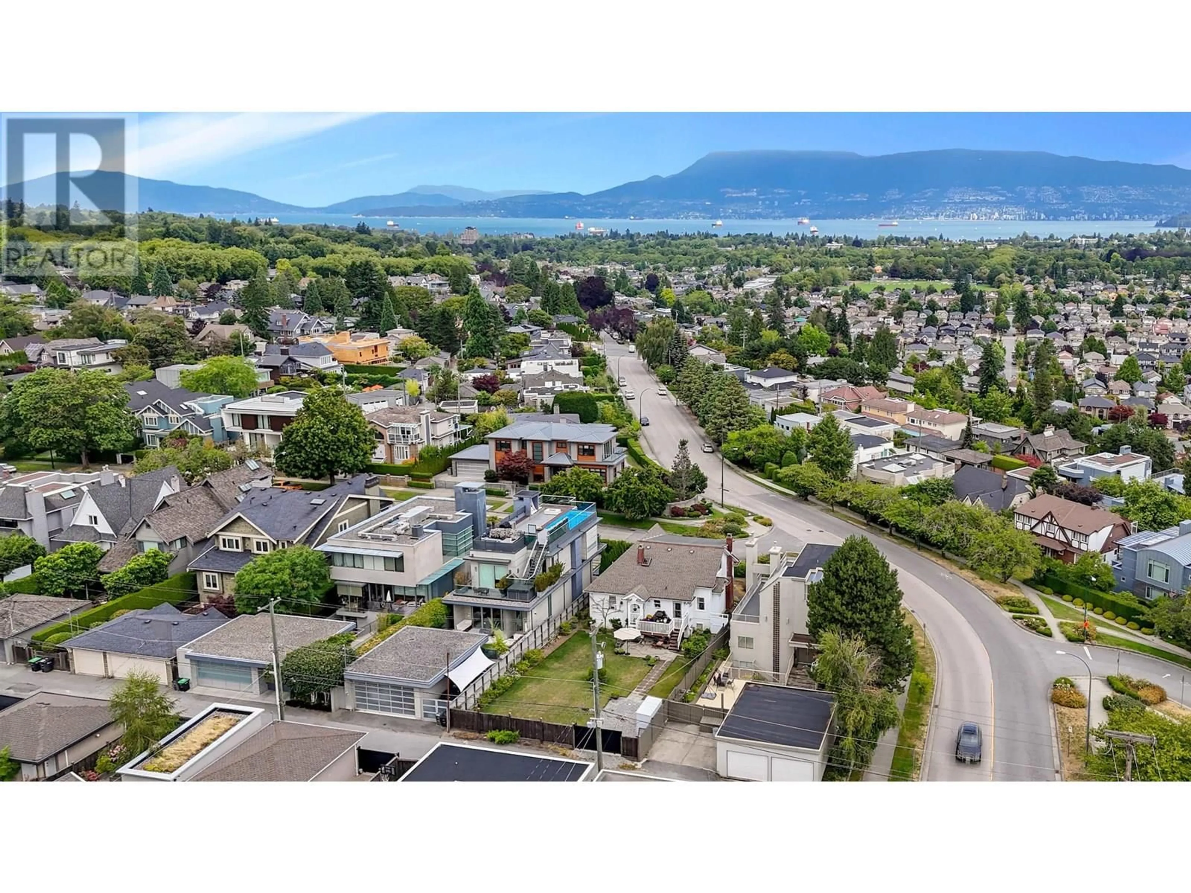 A pic from outside/outdoor area/front of a property/back of a property/a pic from drone, mountain view for 2912 27TH AVENUE, Vancouver British Columbia V6L1W3