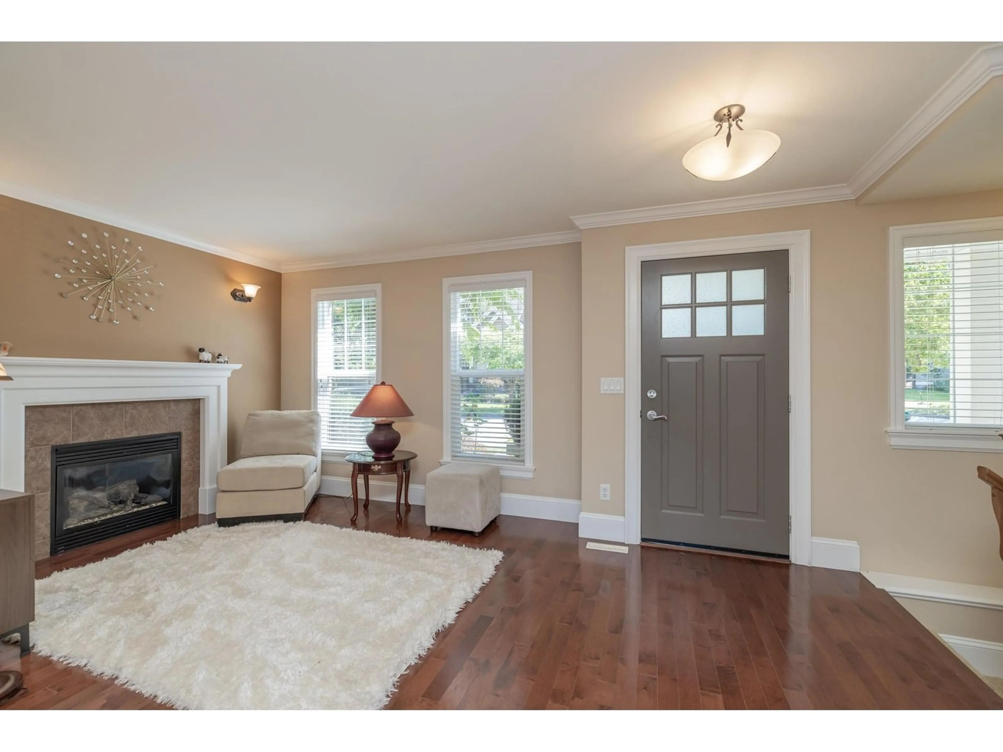 Living room with furniture, wood/laminate floor for 3449 148A, Surrey British Columbia V4P0B9