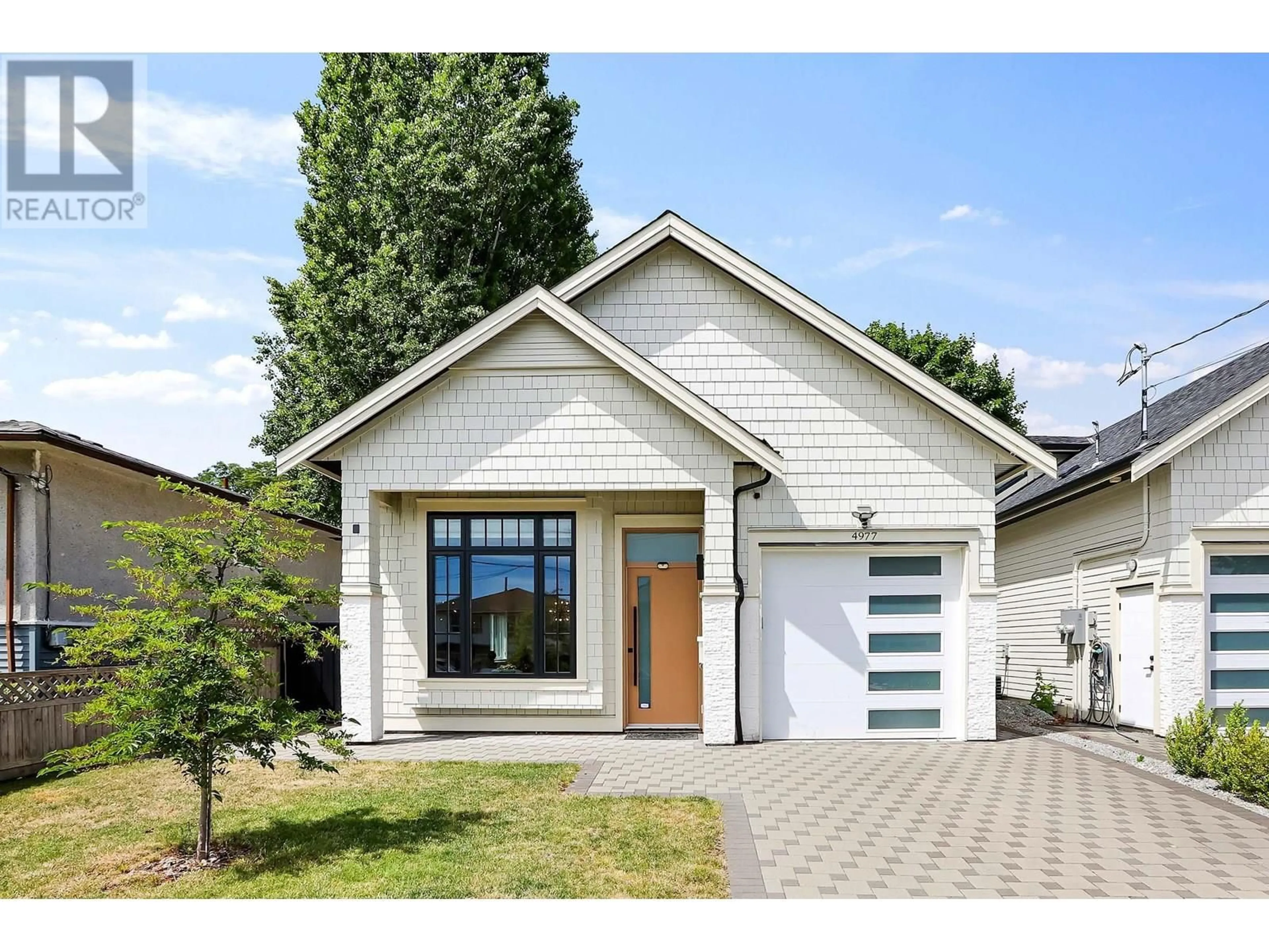 Home with brick exterior material, street for 4977 CHESHAM AVENUE, Burnaby British Columbia V5G2X3