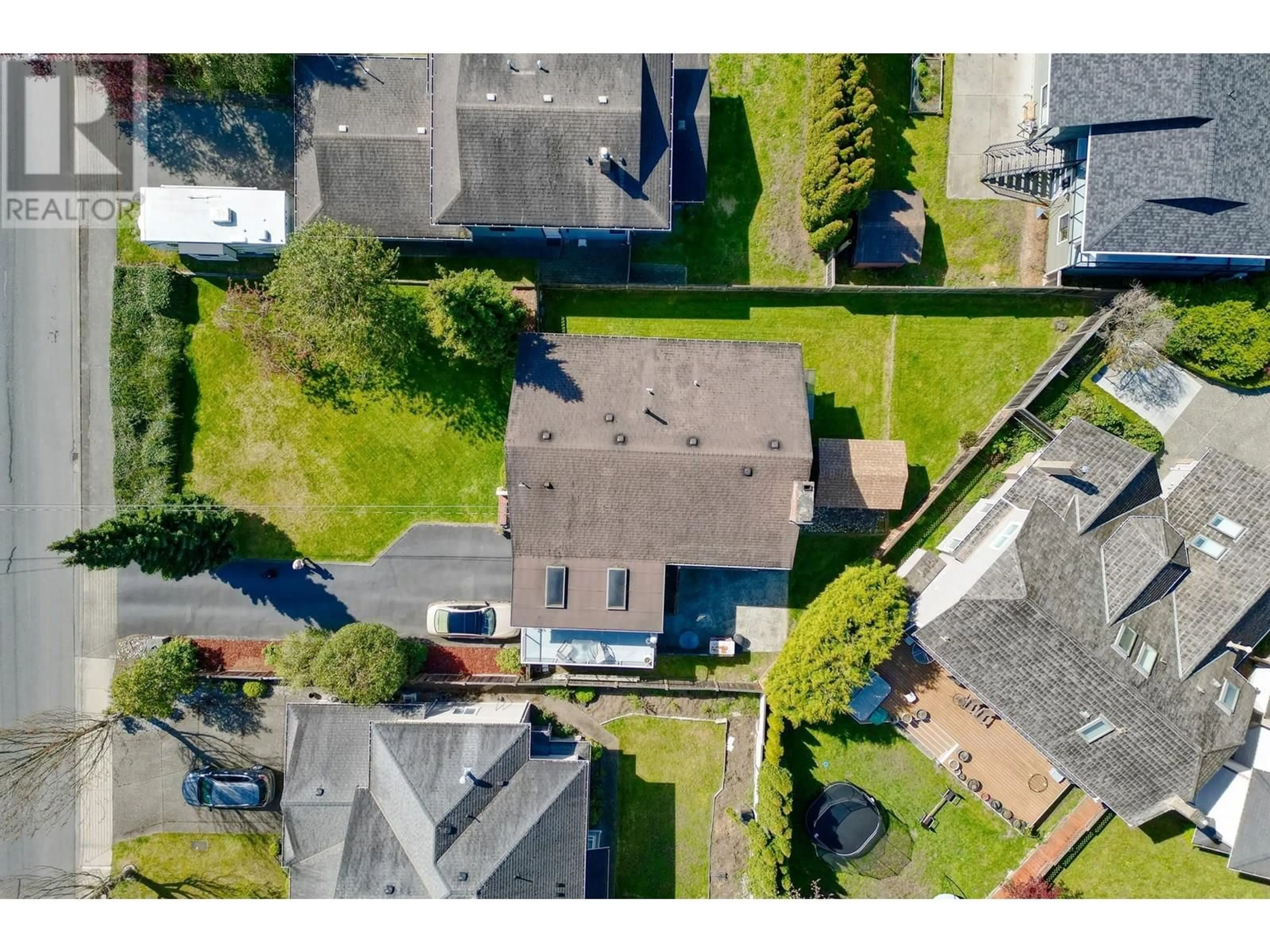 A pic from outside/outdoor area/front of a property/back of a property/a pic from drone, street for 5551 4 AVENUE, Delta British Columbia V4M1H2