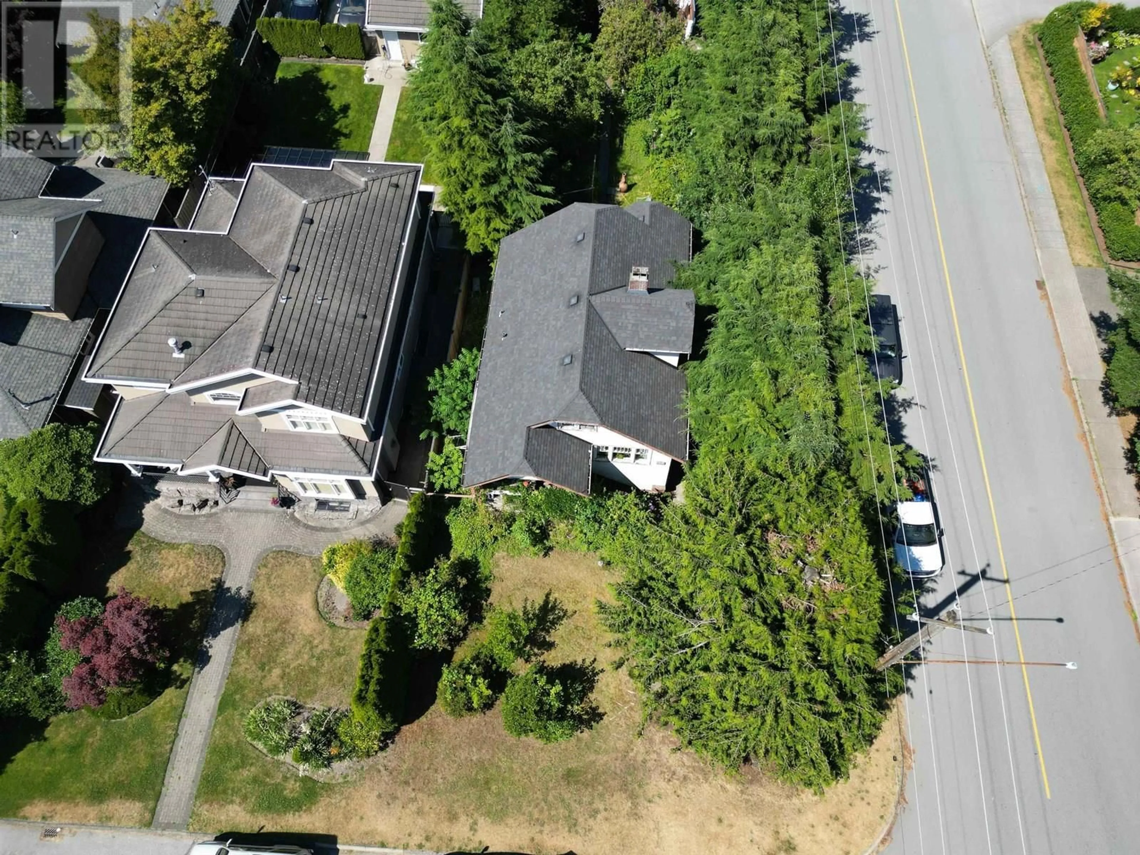 A pic from outside/outdoor area/front of a property/back of a property/a pic from drone, street for 796 11TH STREET, North Vancouver British Columbia V7L2H8