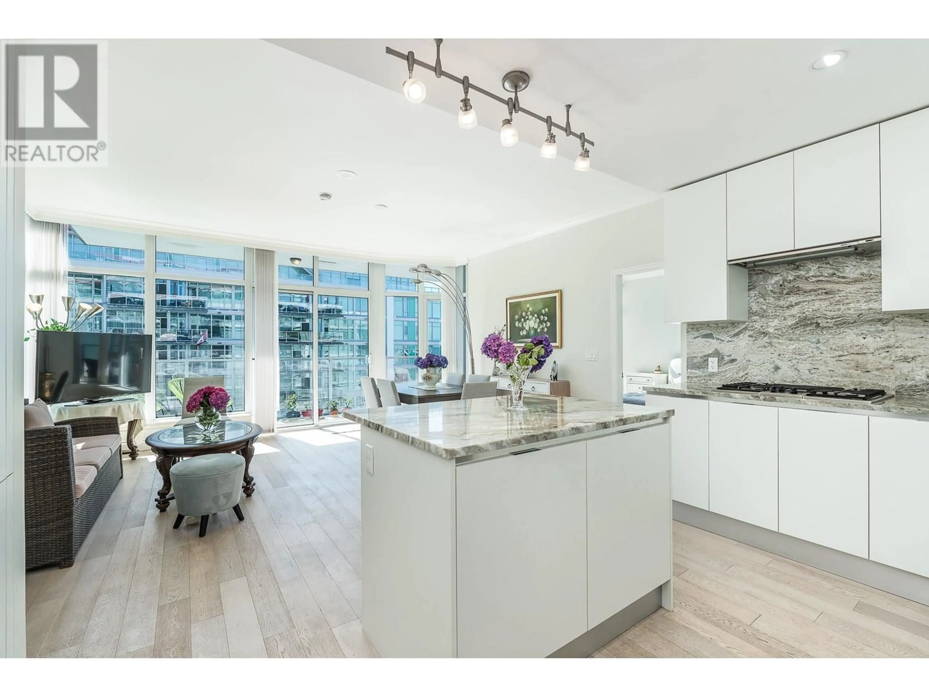 Open concept kitchen, unknown for 703 - 175 VICTORY SHIP WAY, North Vancouver British Columbia V7L0G1