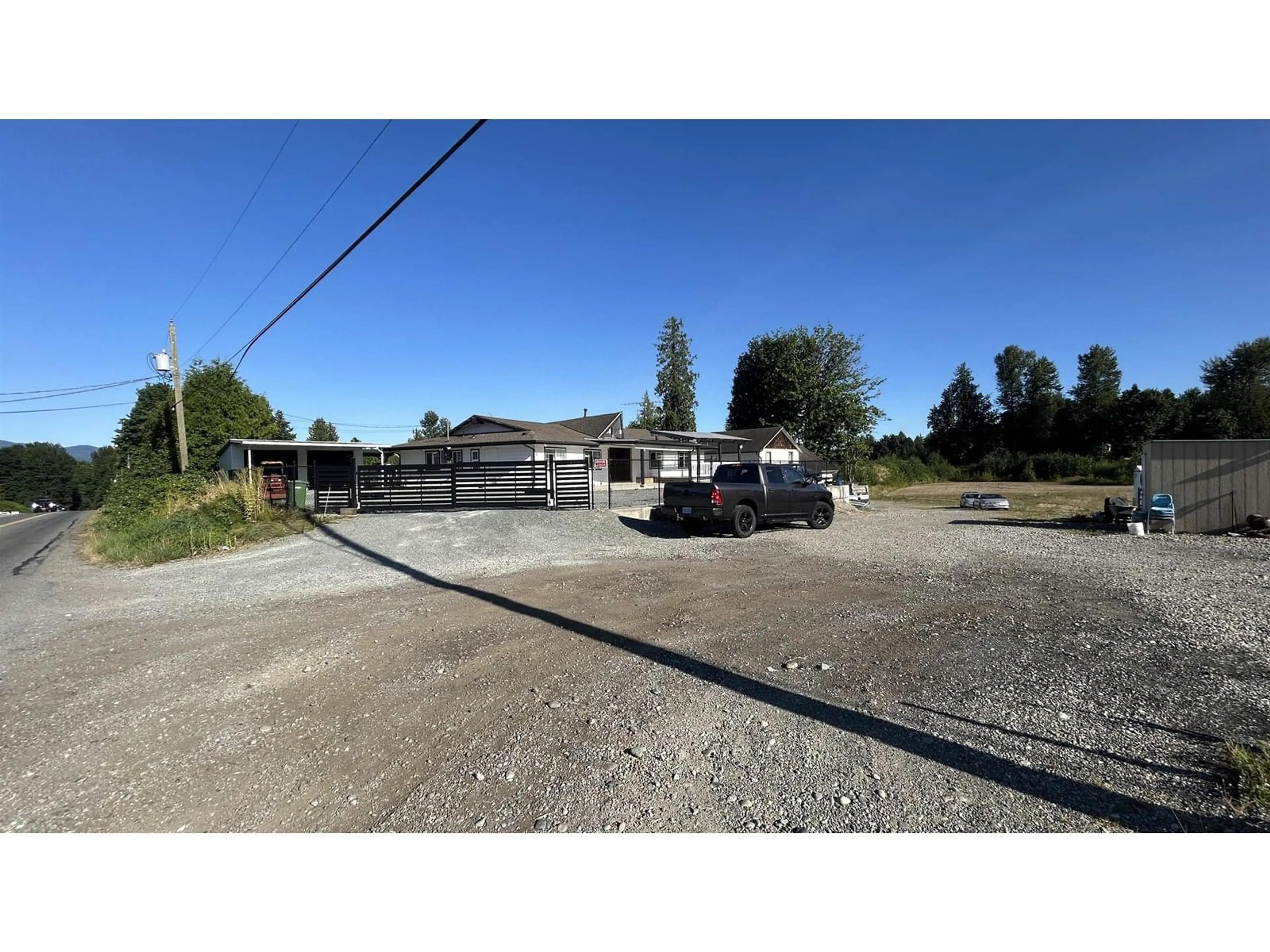 A pic from outside/outdoor area/front of a property/back of a property/a pic from drone, street for 30952 HARRIS ROAD, Abbotsford British Columbia V4X1W2