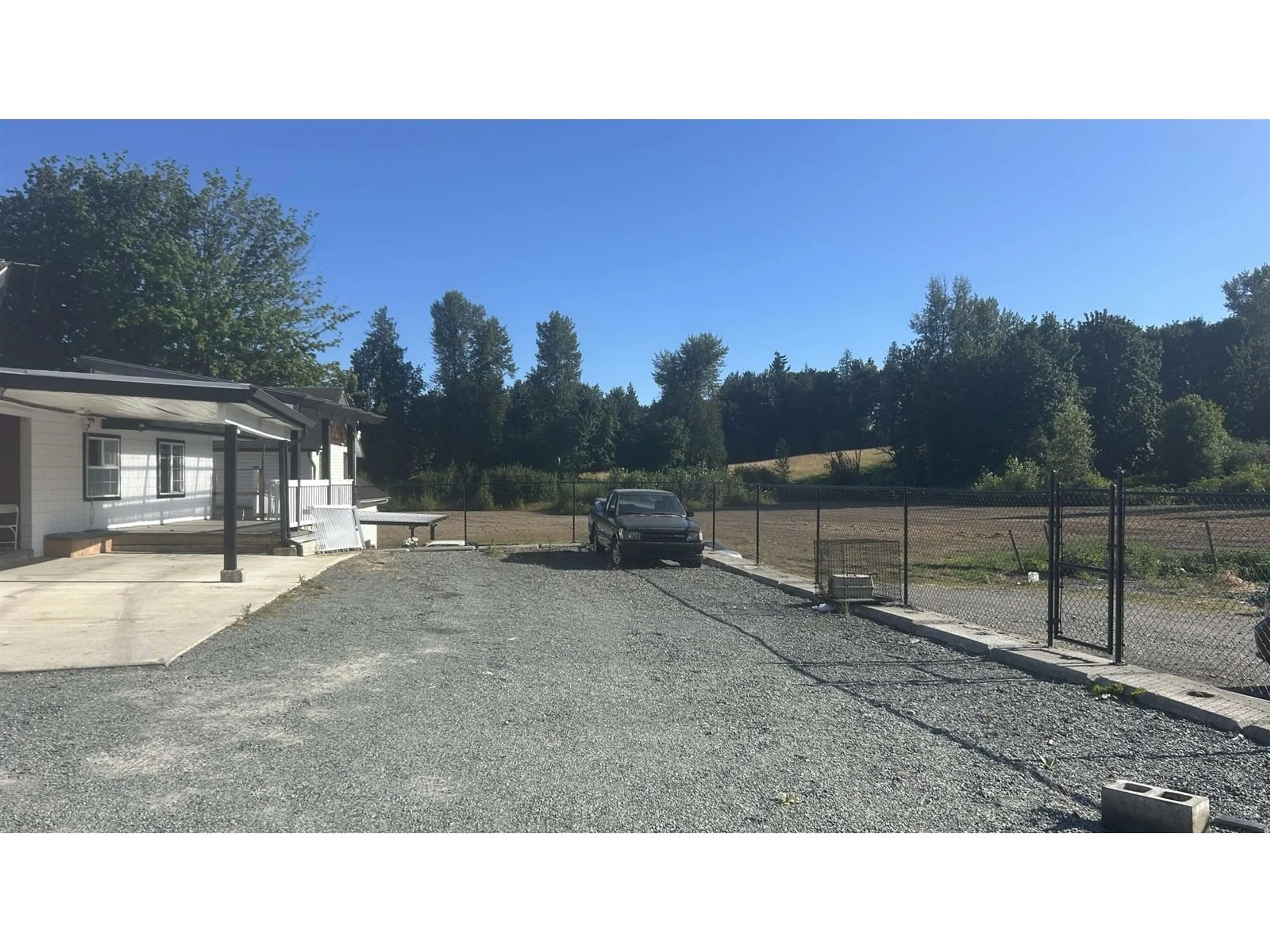 A pic from outside/outdoor area/front of a property/back of a property/a pic from drone, street for 30952 HARRIS ROAD, Abbotsford British Columbia V4X1W2