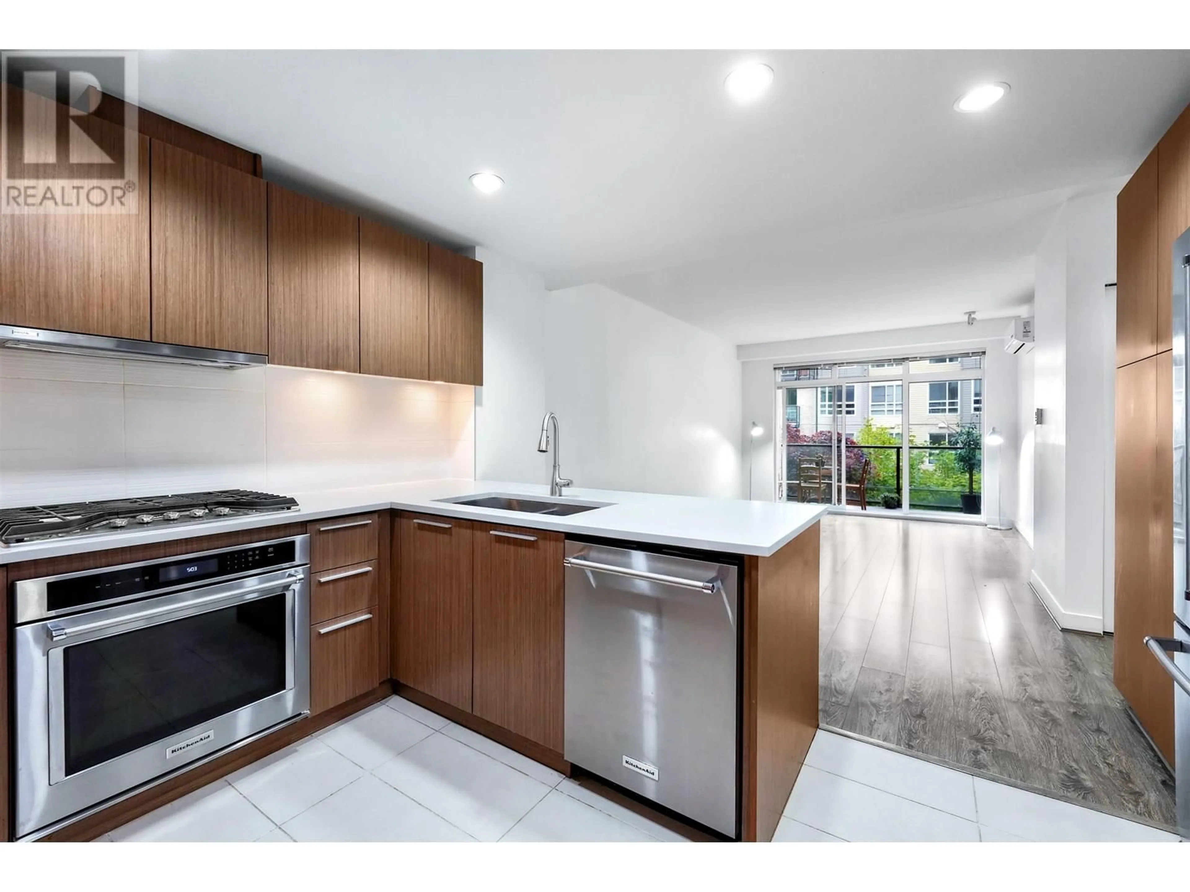 Open concept kitchen, ceramic/tile floor for 206 - 3462 ROSS DRIVE, Vancouver British Columbia V6S0H6