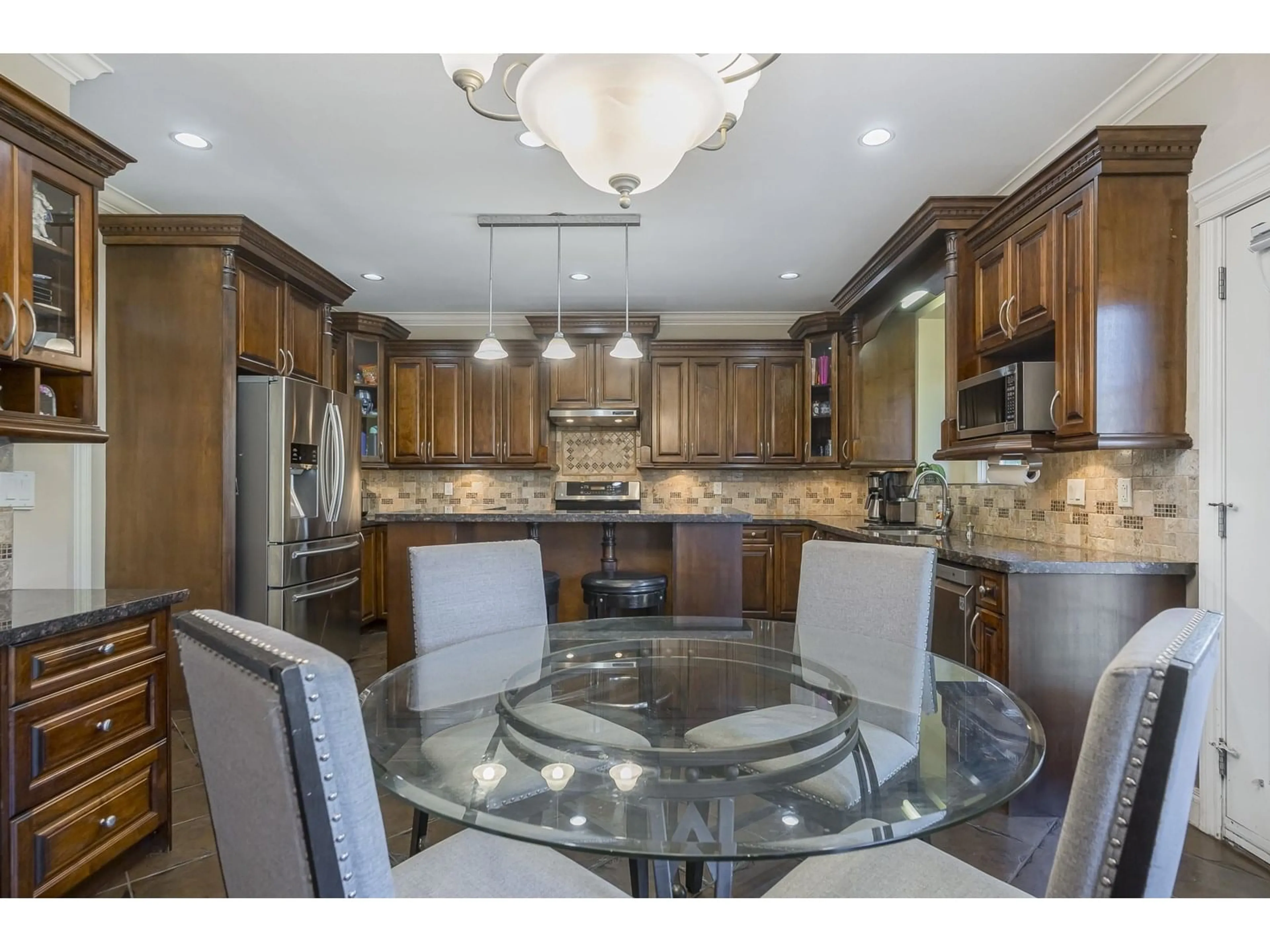 Open concept kitchen, ceramic/tile floor for 21179 83A, Langley British Columbia V2Y0C4