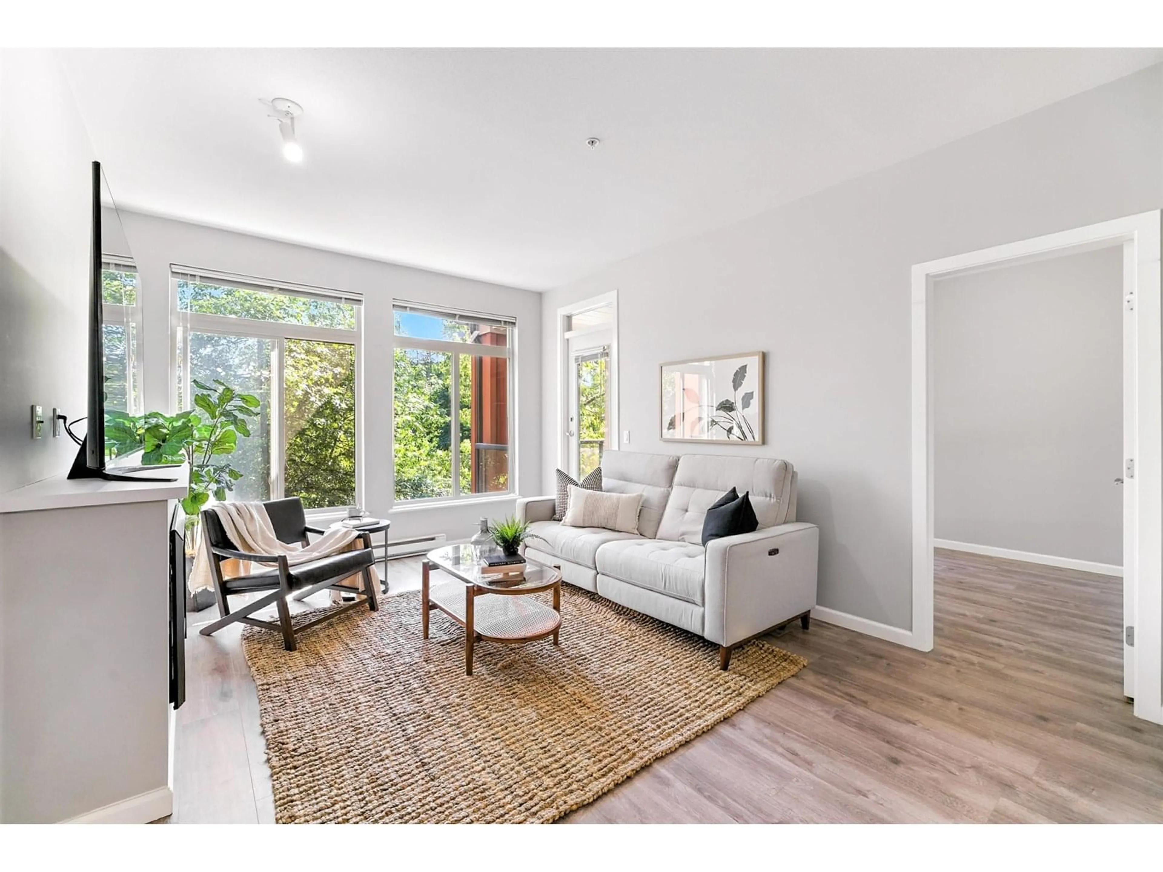 Living room with furniture, unknown for 301 - 15385 101A, Surrey British Columbia V3R0B4