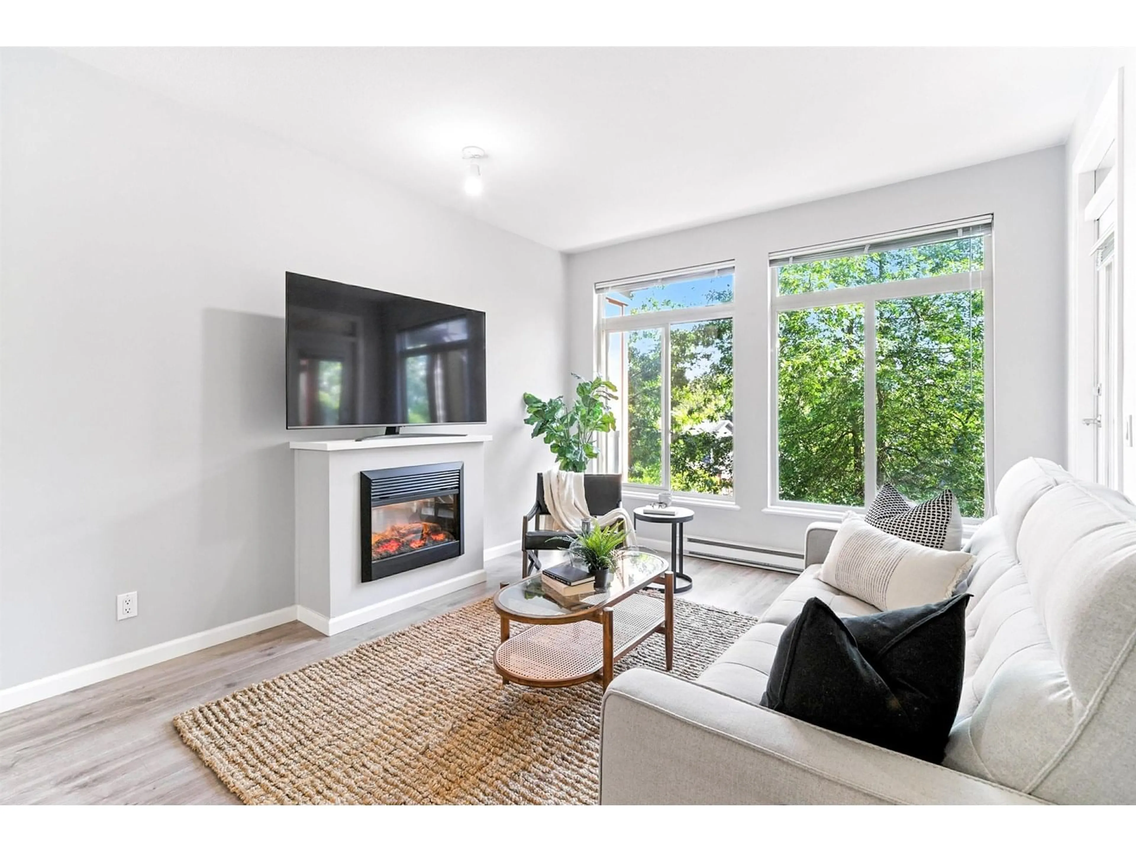 Living room with furniture, unknown for 301 - 15385 101A, Surrey British Columbia V3R0B4