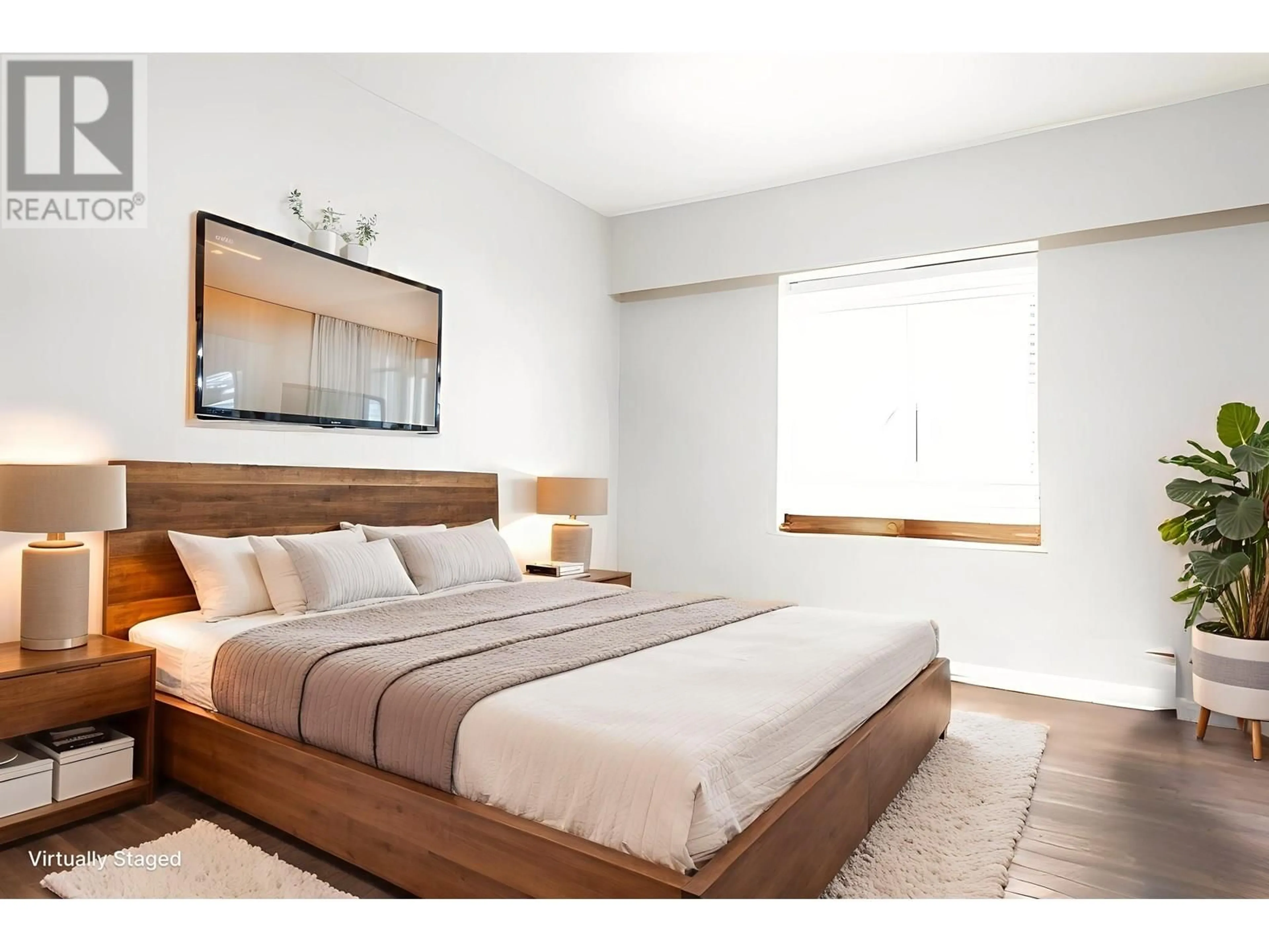 Bedroom with bed, wood/laminate floor for 207 - 2025 2ND AVENUE, Vancouver British Columbia V6J1J6