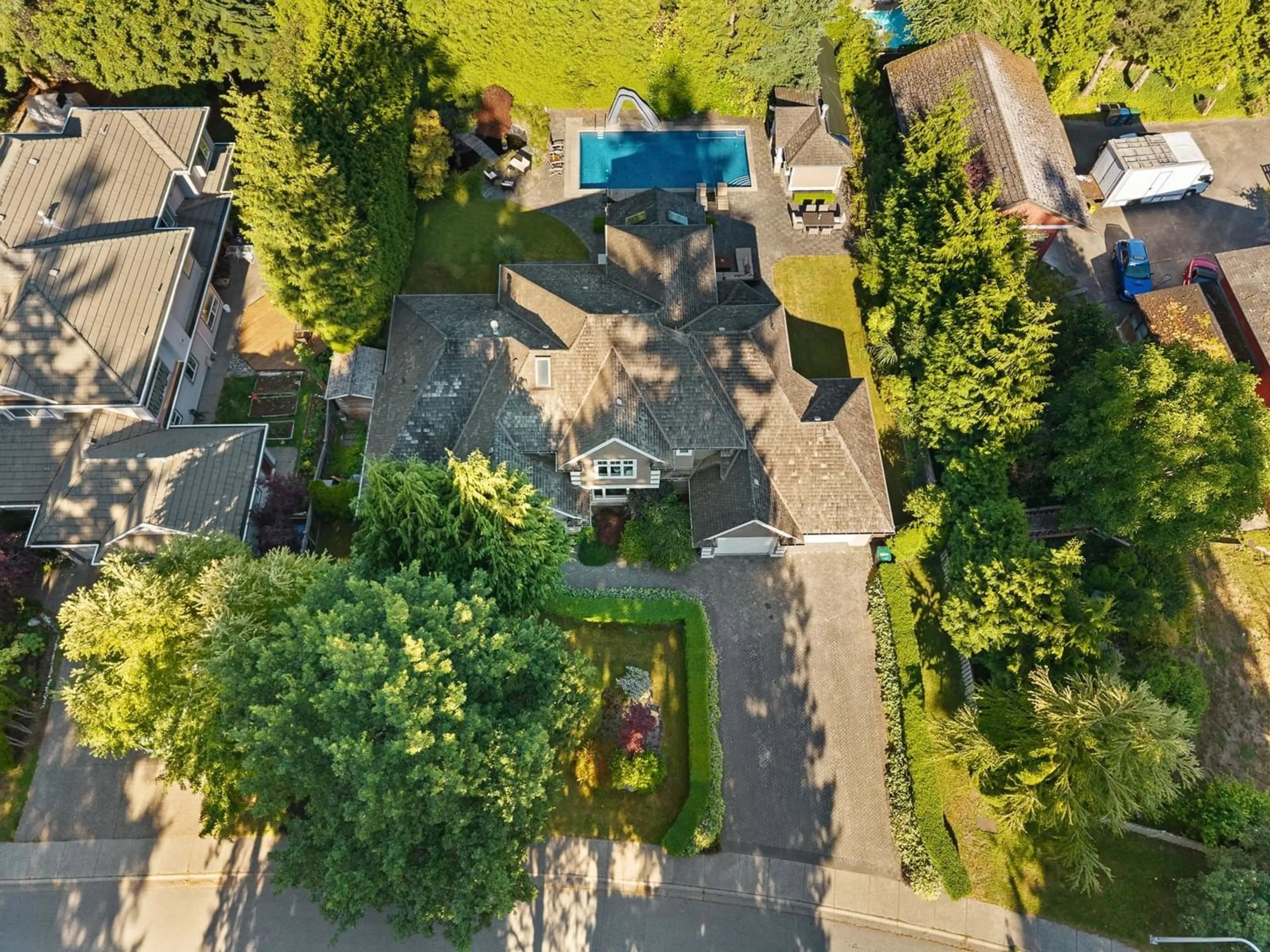 A pic from outside/outdoor area/front of a property/back of a property/a pic from drone, street for 2372 132, Surrey British Columbia V4A9B2