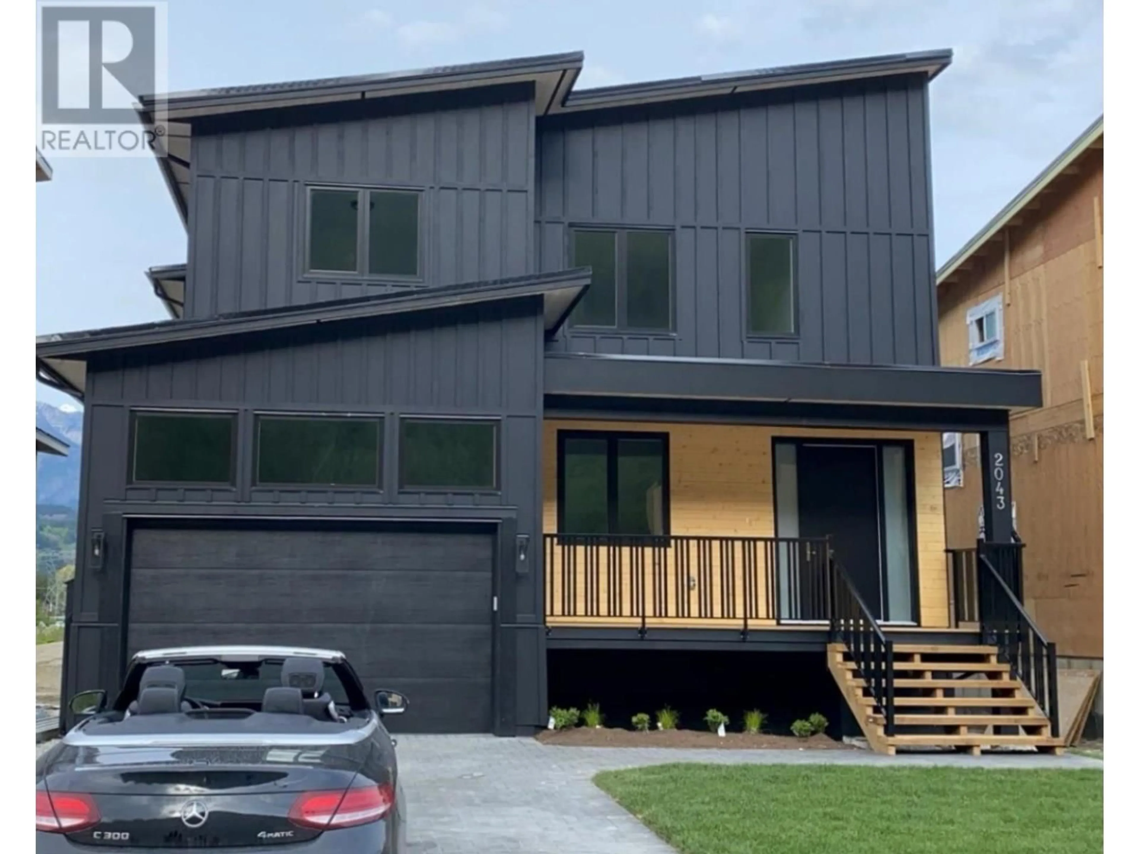 Home with vinyl exterior material, street for 2043 TIYATA BOULEVARD, Pemberton British Columbia V0N2L0