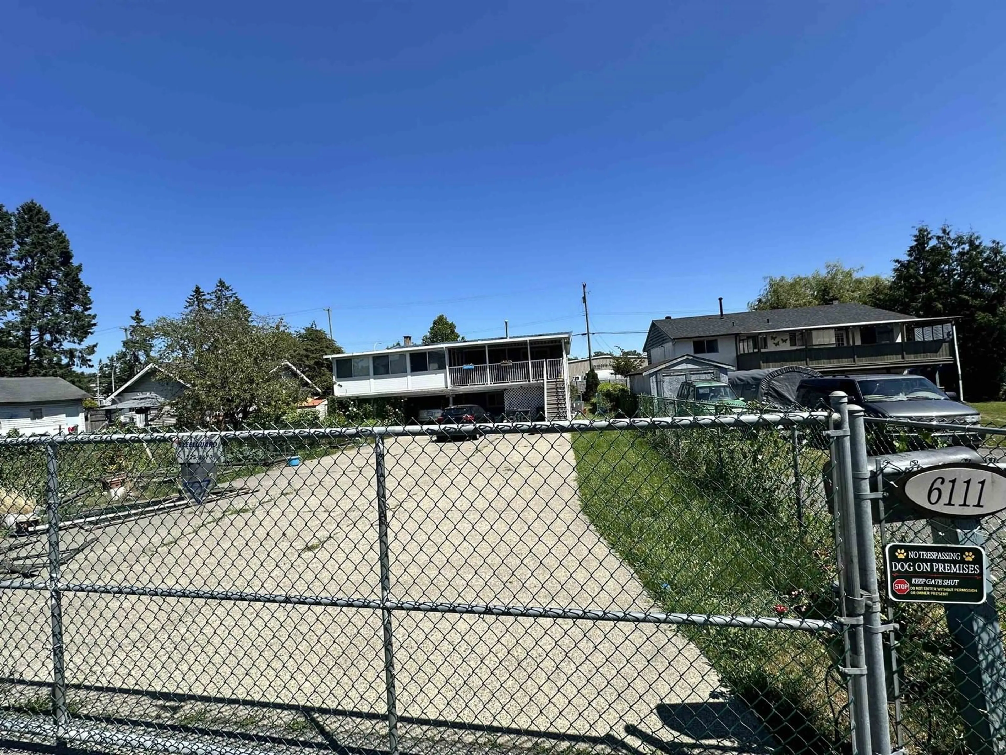 A pic from outside/outdoor area/front of a property/back of a property/a pic from drone, unknown for 6111 176, Surrey British Columbia V3S4E8
