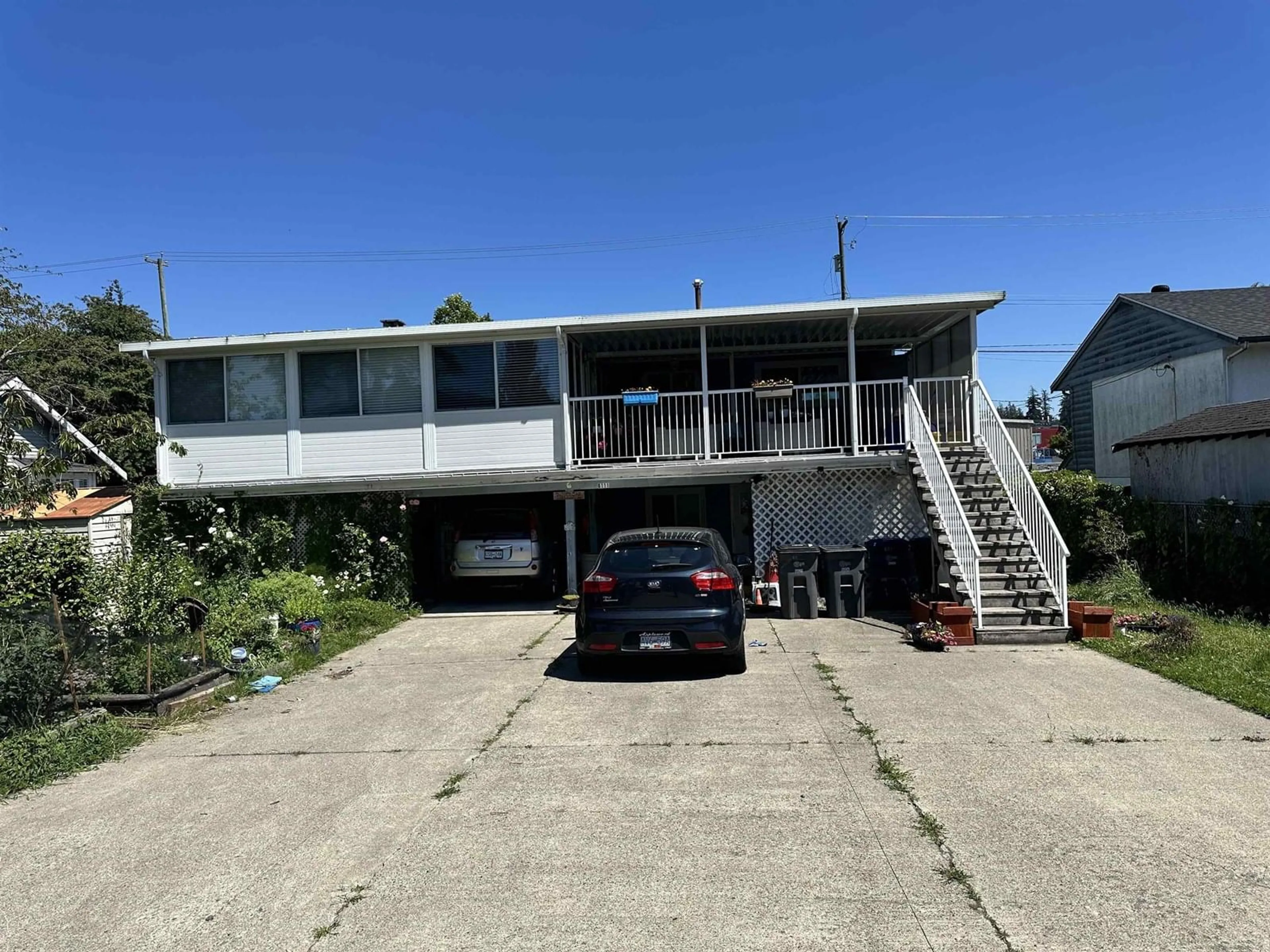 A pic from outside/outdoor area/front of a property/back of a property/a pic from drone, unknown for 6111 176, Surrey British Columbia V3S4E8