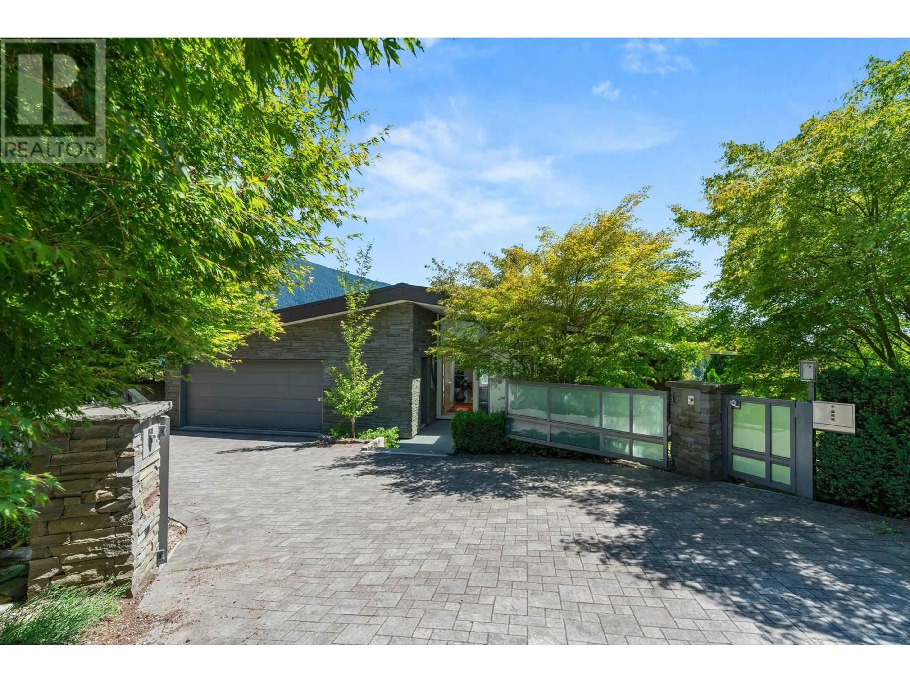 A pic from outside/outdoor area/front of a property/back of a property/a pic from drone, street for 98 BONNYMUIR DRIVE, West Vancouver British Columbia V7S1L2