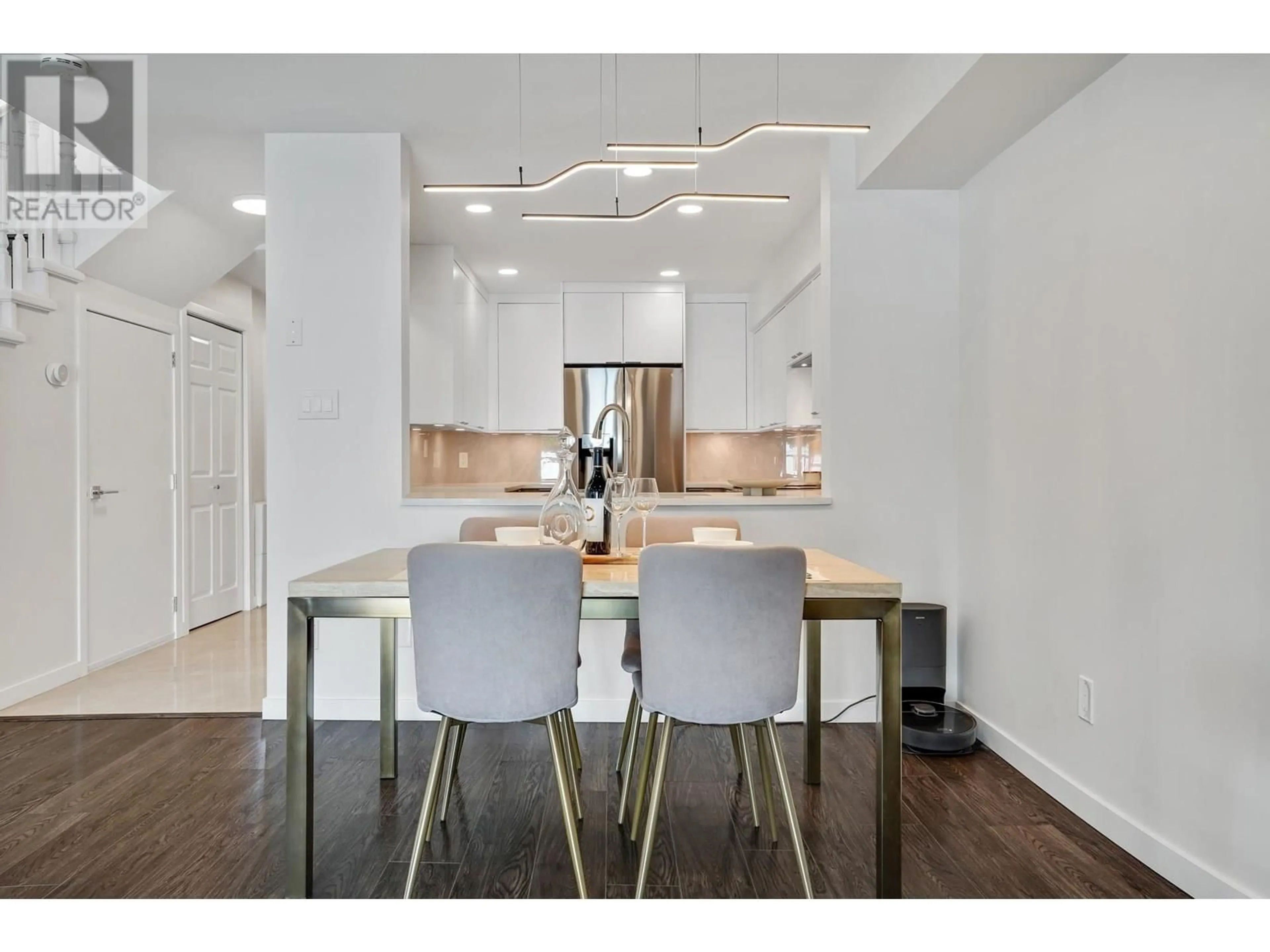 Open concept kitchen, wood/laminate floor for 9 - 7760 MINORU BOULEVARD, Richmond British Columbia V6Y1Z5