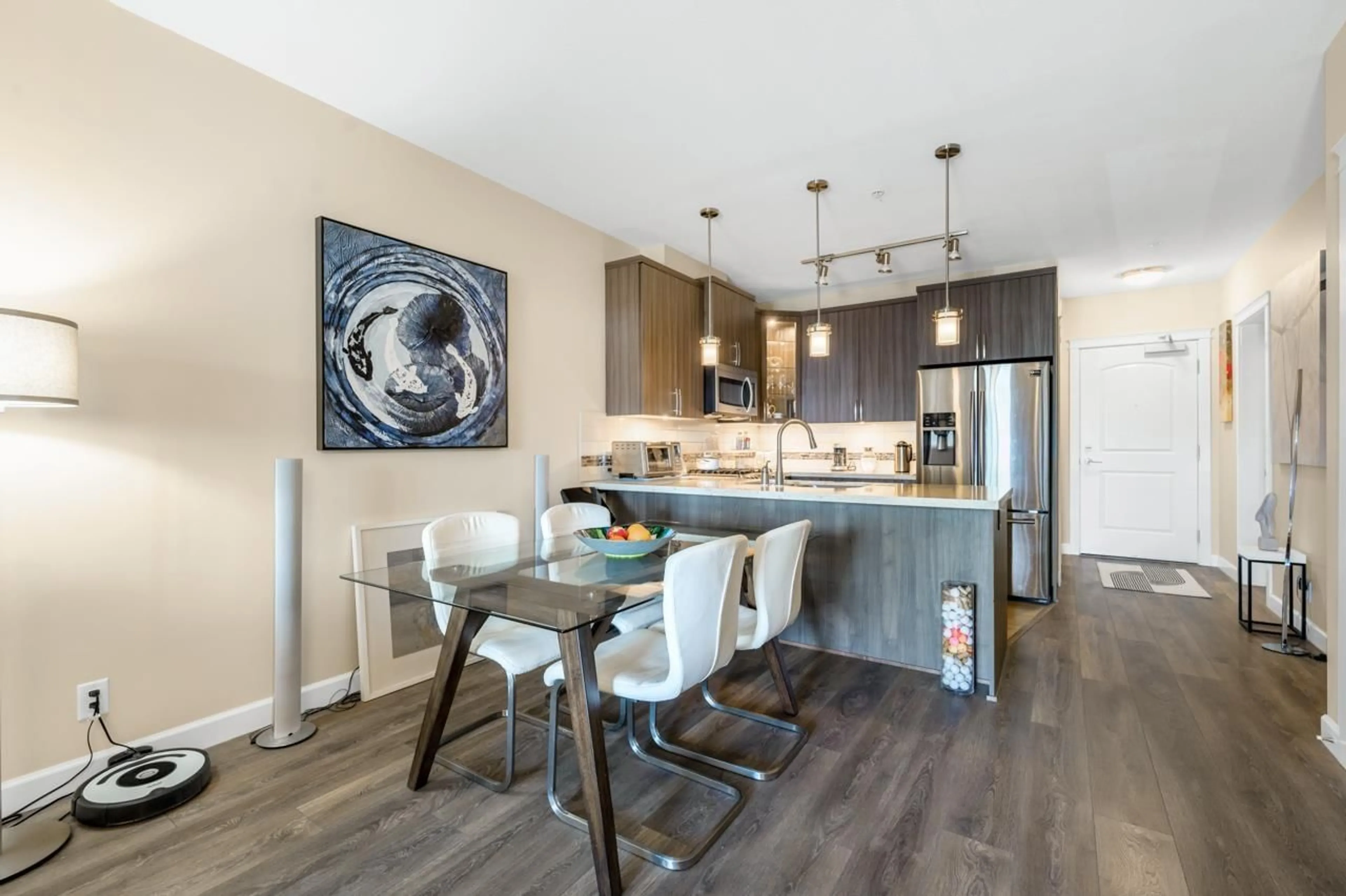 Open concept kitchen, wood/laminate floor for A507 - 20716 WILLOUGHBY TOWN CENTRE, Langley British Columbia V2Y3J7