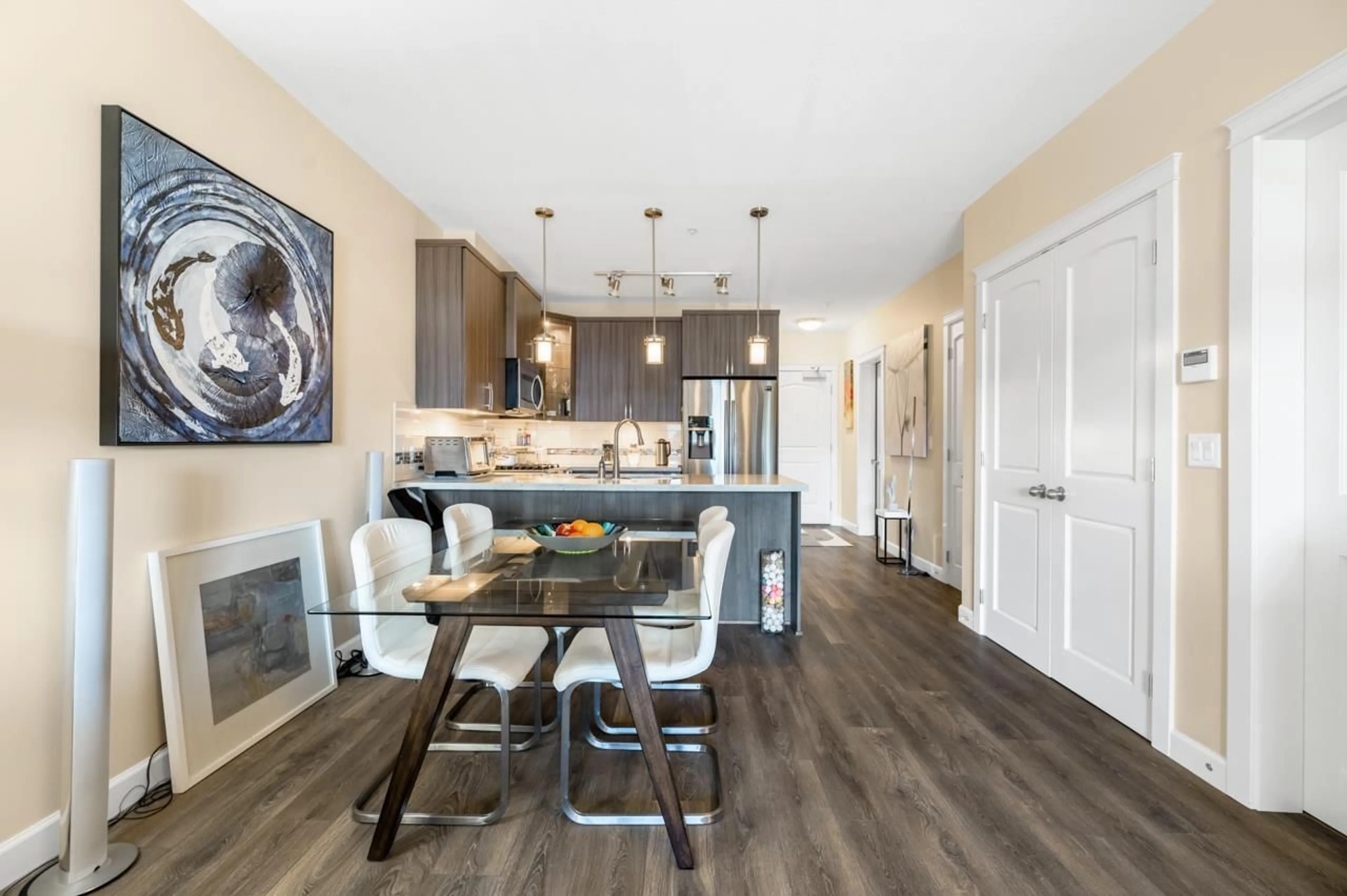 Open concept kitchen, wood/laminate floor for A507 - 20716 WILLOUGHBY TOWN CENTRE, Langley British Columbia V2Y3J7