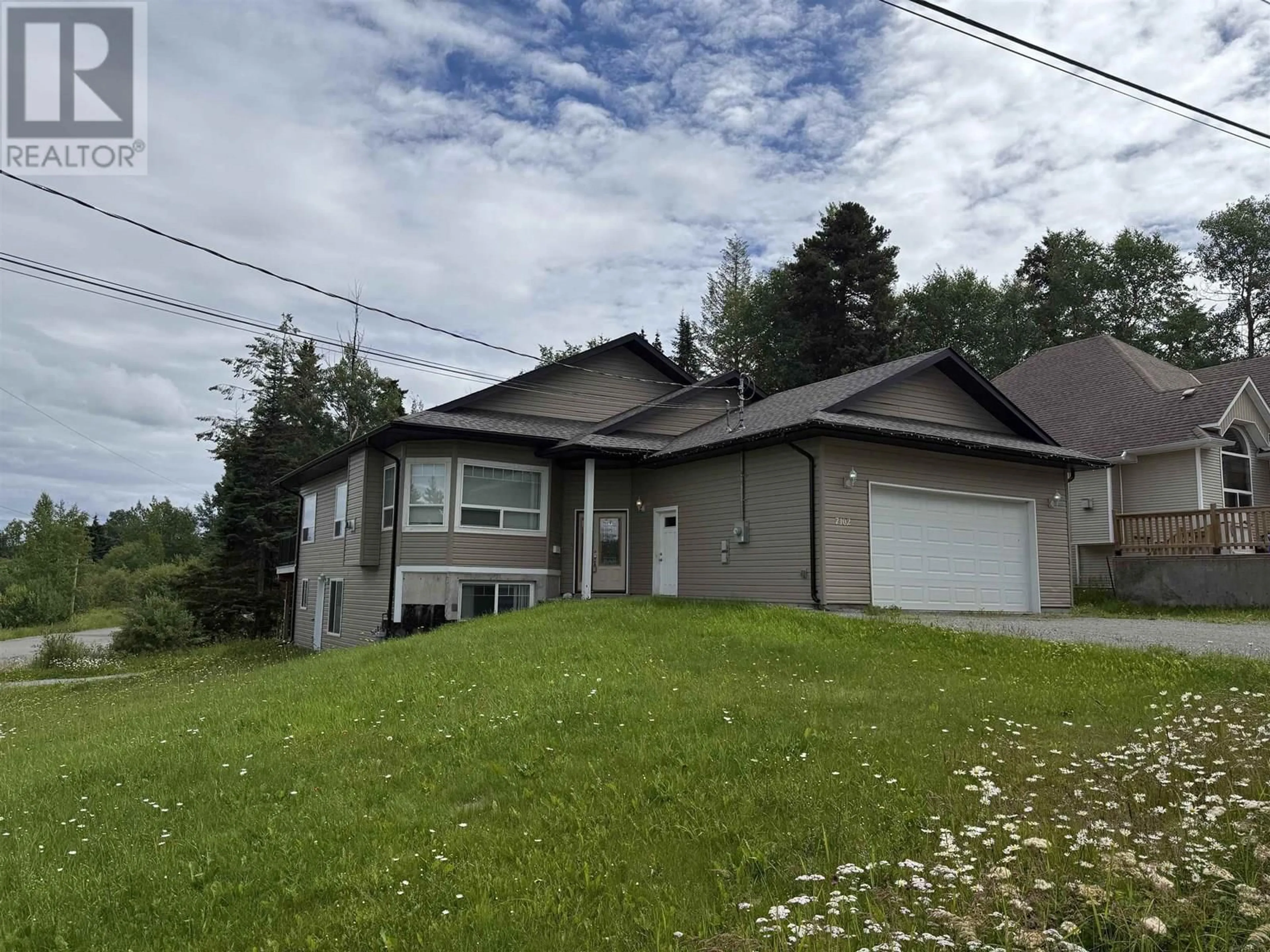 A pic from outside/outdoor area/front of a property/back of a property/a pic from drone, street for 7102 ELK ROAD, Prince George British Columbia V2N5N9