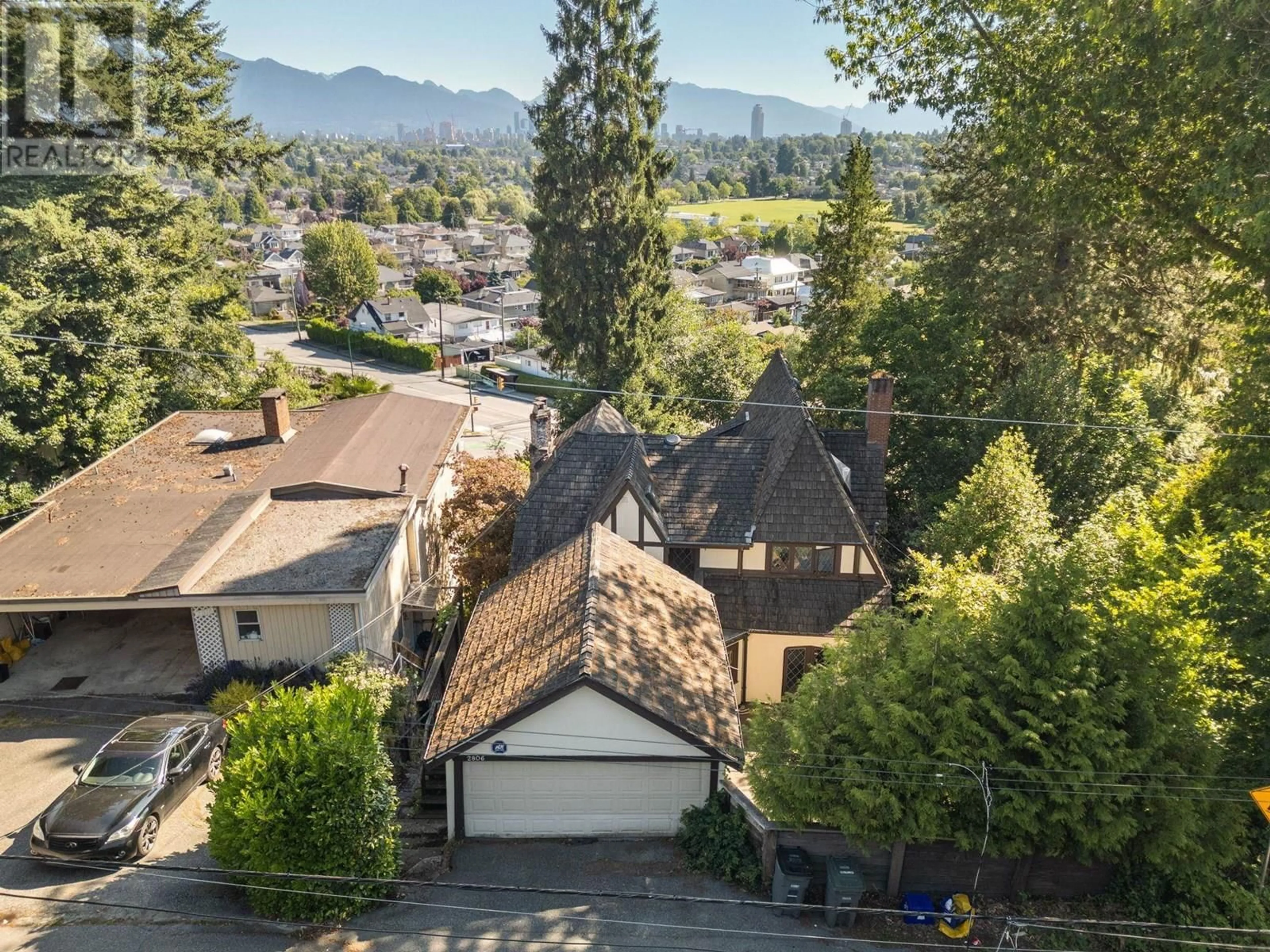 A pic from outside/outdoor area/front of a property/back of a property/a pic from drone, mountain view for 2806 KING EDWARD AVENUE, Vancouver British Columbia V6L1T9