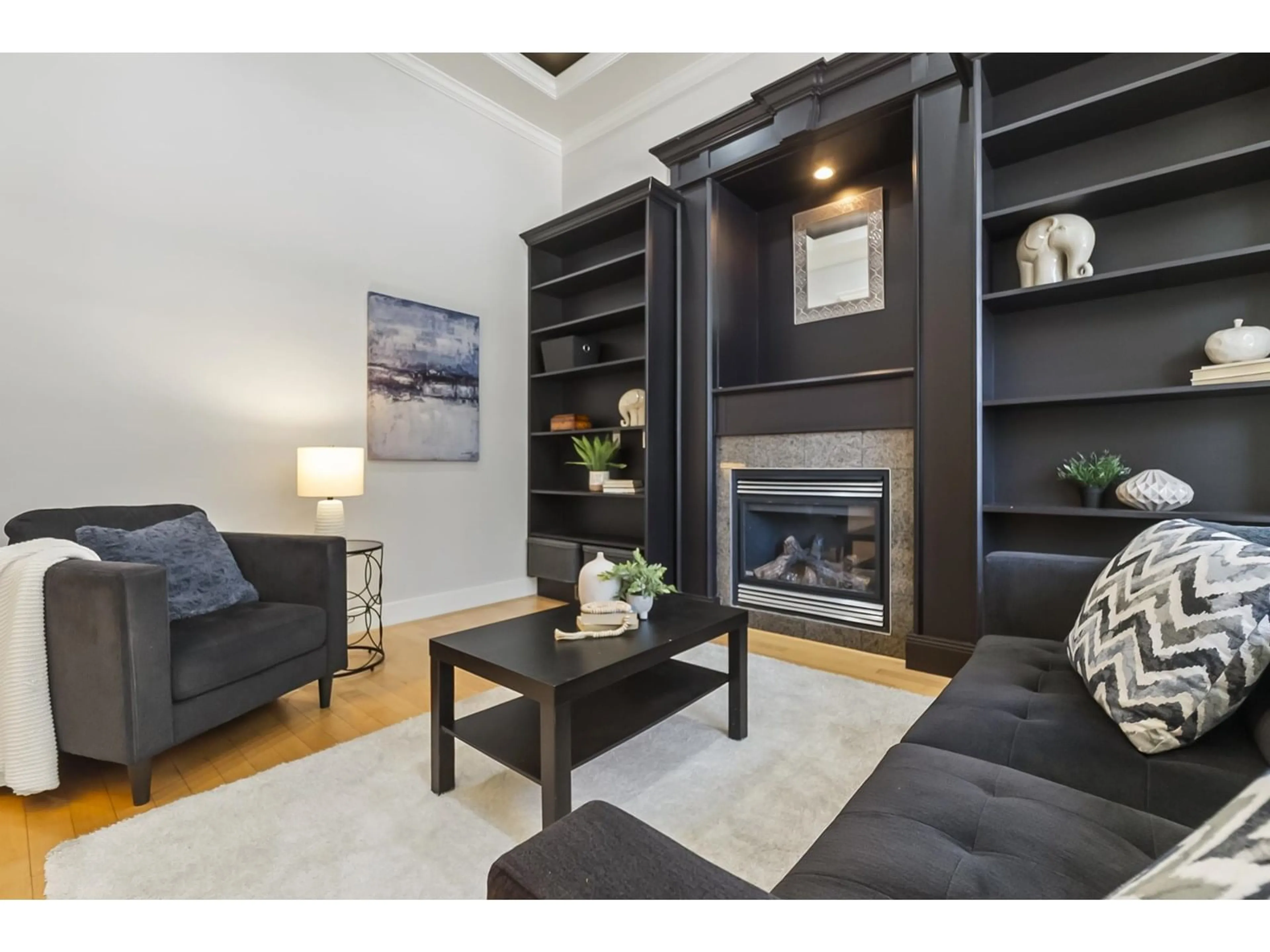 Living room with furniture, wood/laminate floor for 3531 150A, Surrey British Columbia V3S0Y2