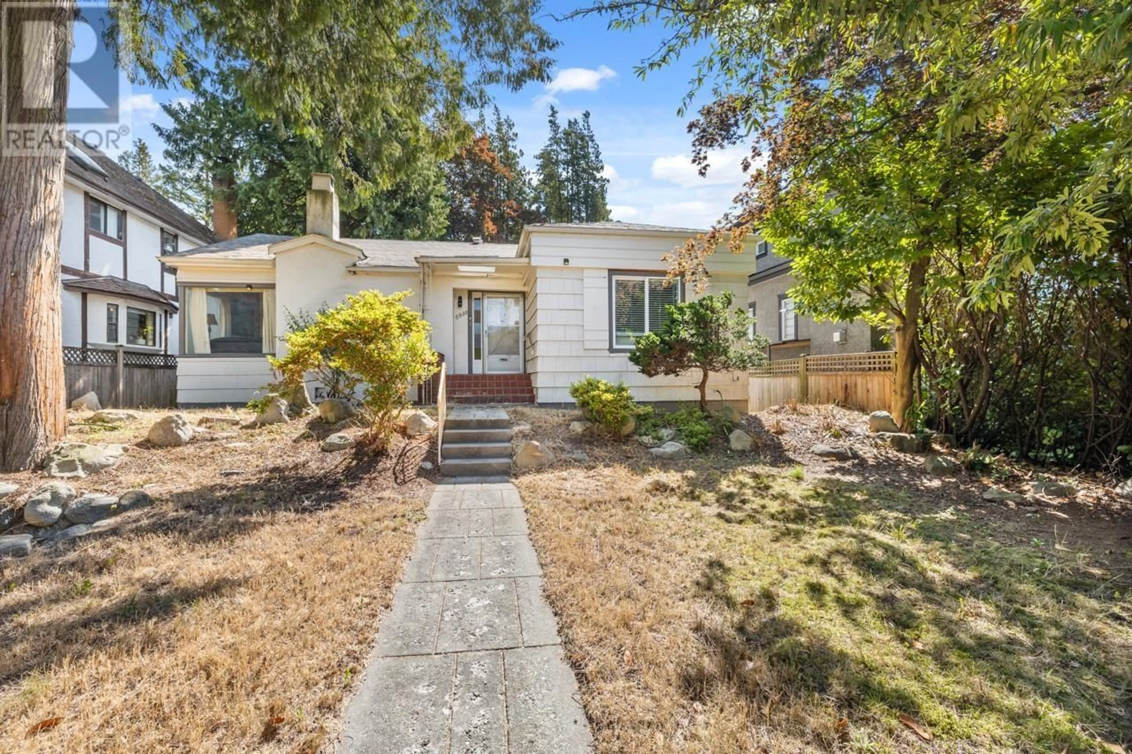 Home with vinyl exterior material, street for 6930 GRANVILLE STREET, Vancouver British Columbia V6P4X5