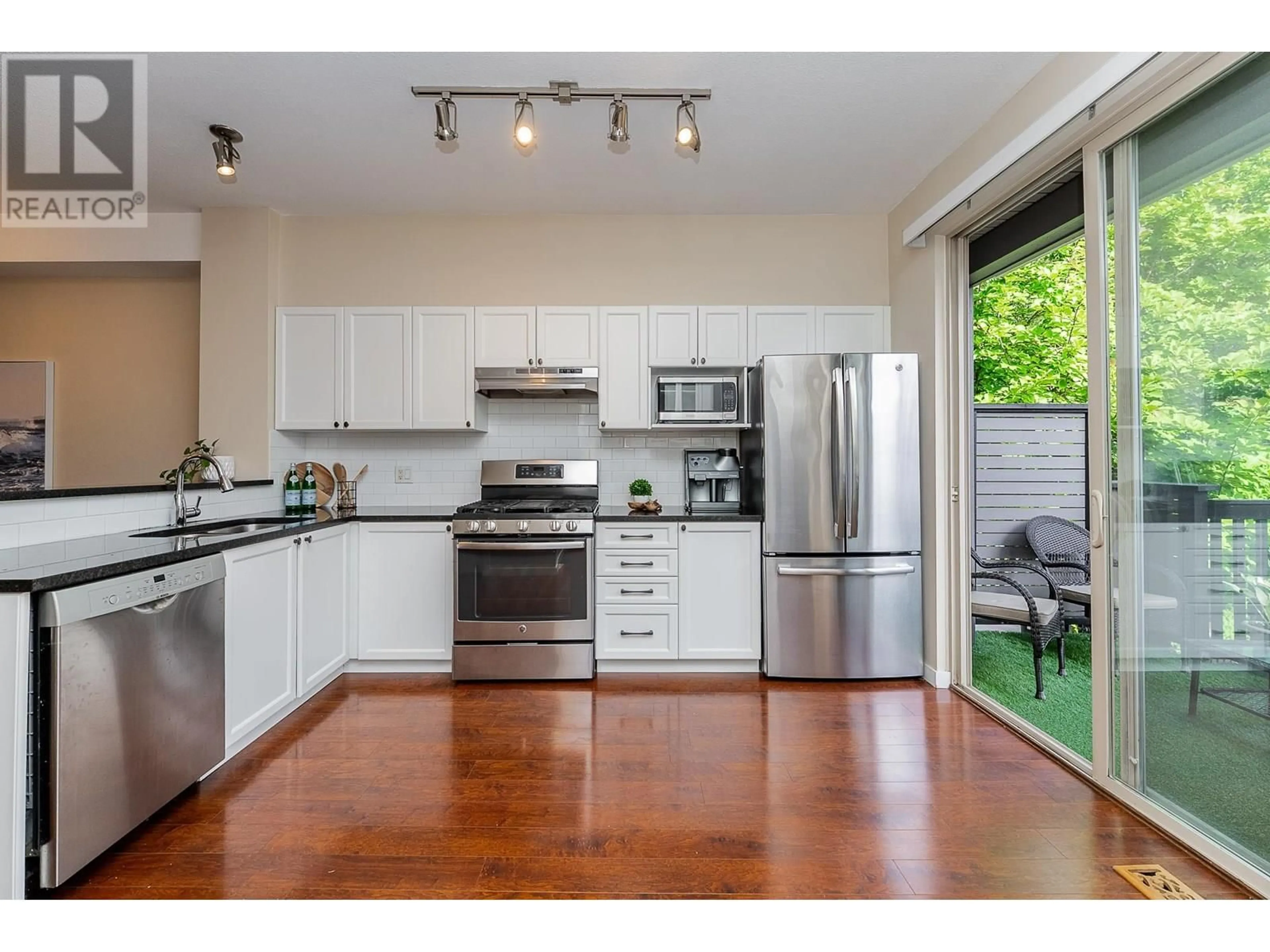 Open concept kitchen, wood/laminate floor for 17 - 100 KLAHANIE DRIVE, Port Moody British Columbia V3H5K3