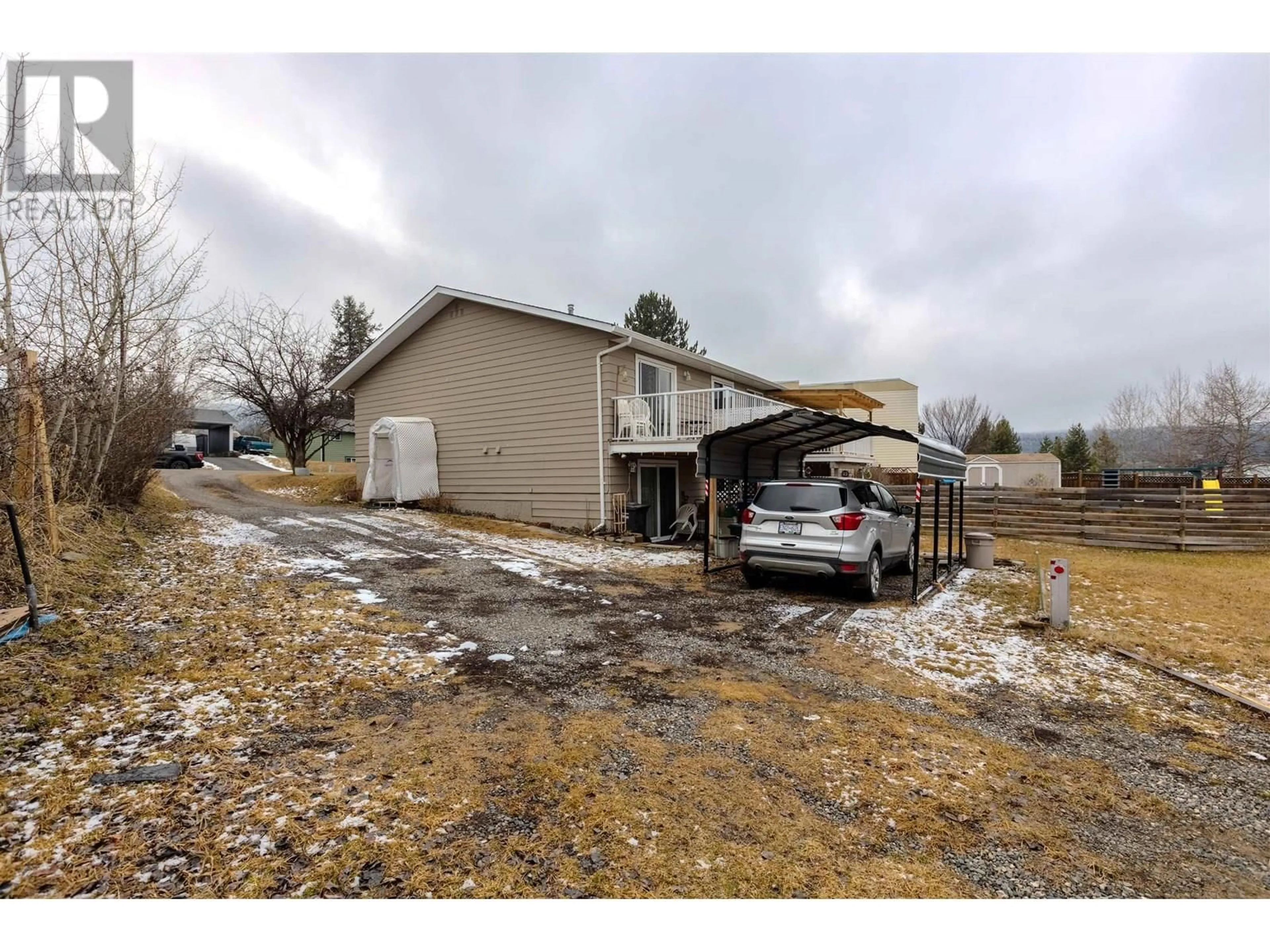 A pic from outside/outdoor area/front of a property/back of a property/a pic from drone, street for 238 ELM AVENUE, 100 Mile House British Columbia V0K2E0