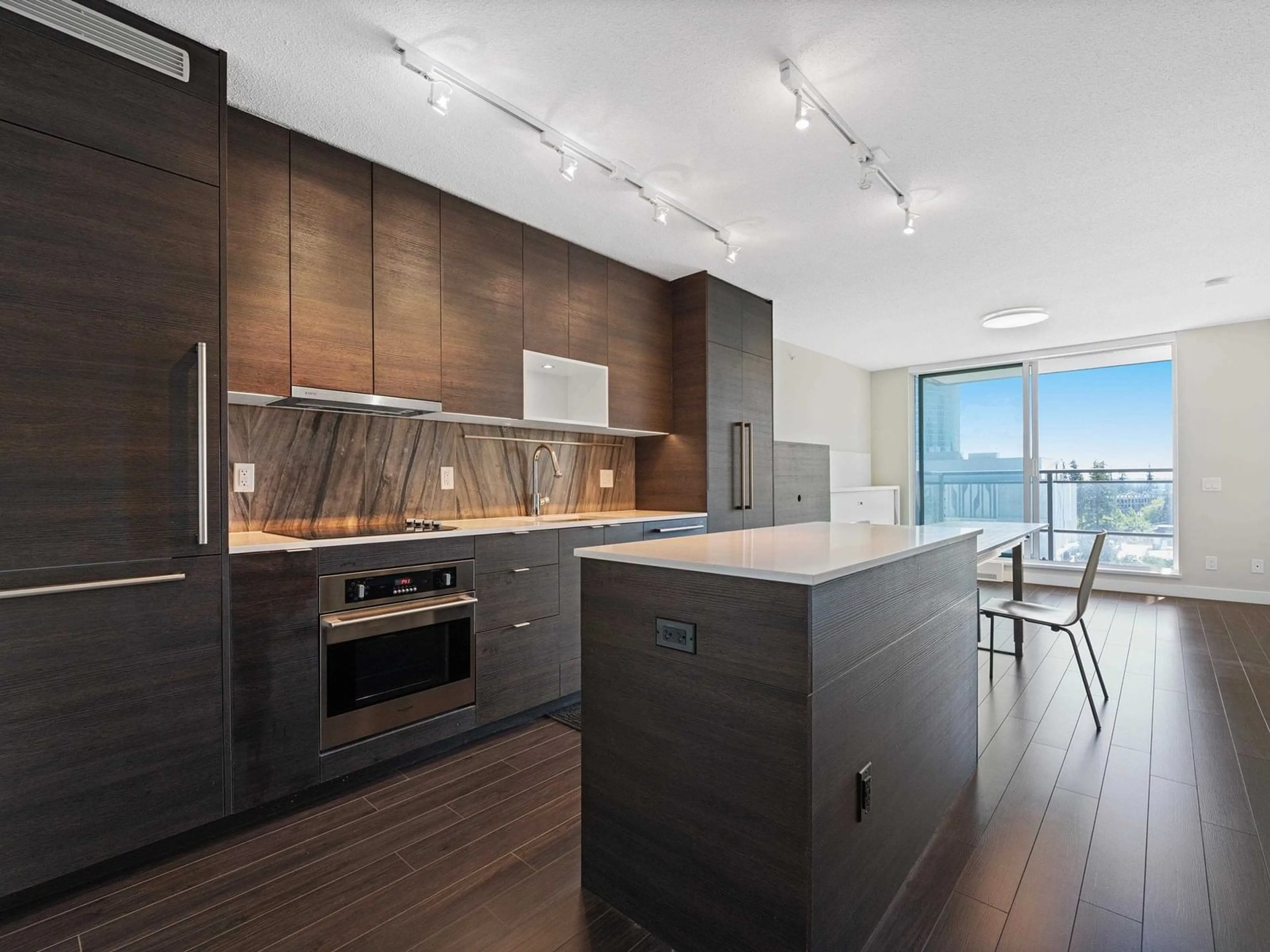 Contemporary kitchen, wood/laminate floor for 1101 - 13398 104, Surrey British Columbia V3T1V6