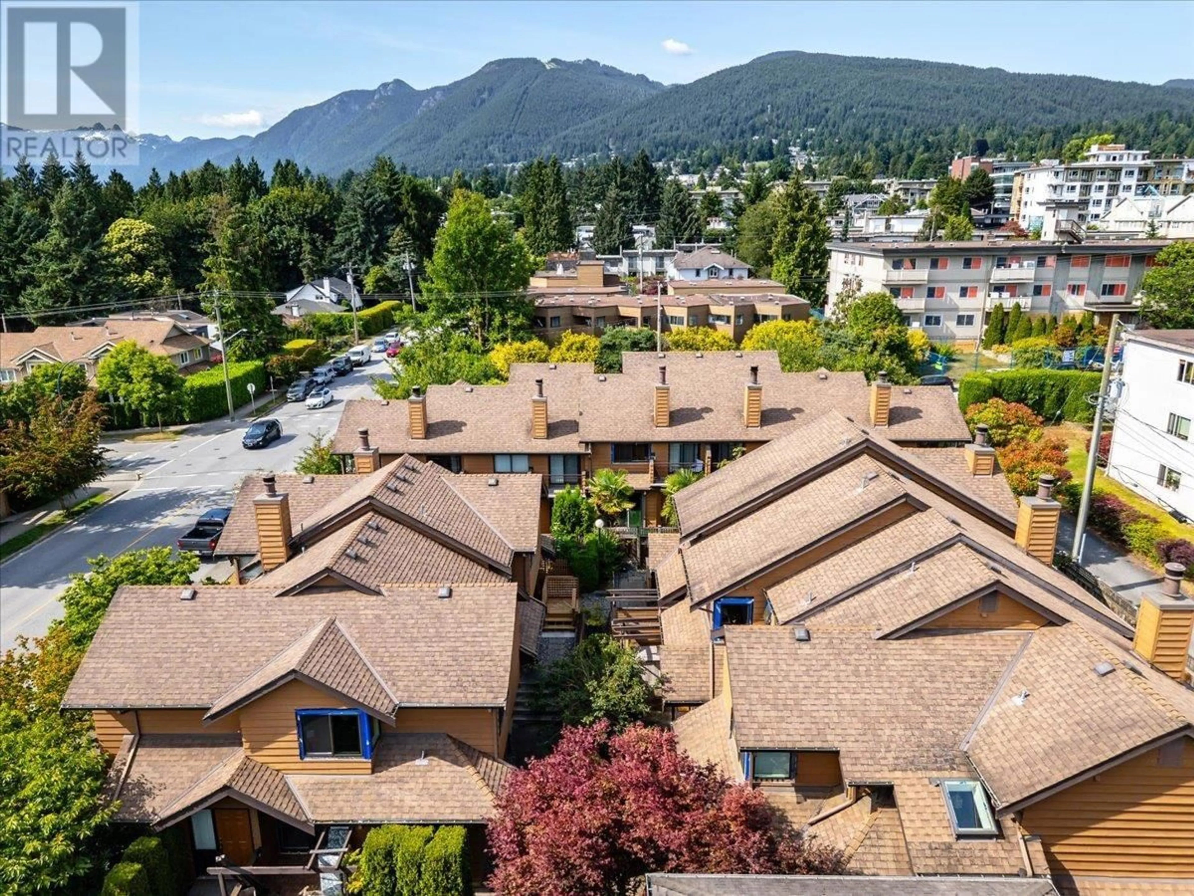 A pic from outside/outdoor area/front of a property/back of a property/a pic from drone, mountain view for 1842 CHESTERFIELD AVENUE, North Vancouver British Columbia V7M2P3