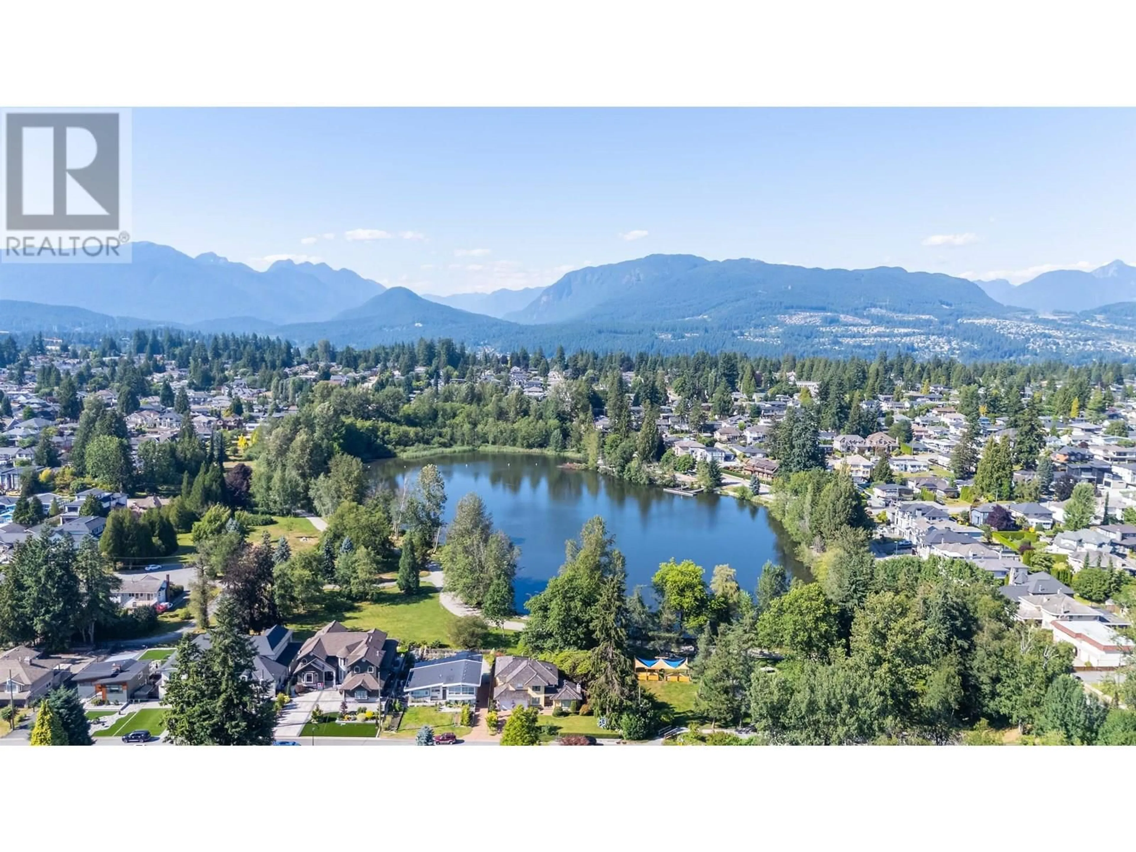 A pic from outside/outdoor area/front of a property/back of a property/a pic from drone, water/lake/river/ocean view for 667 LAKESHORE DRIVE, Coquitlam British Columbia V3J5E5