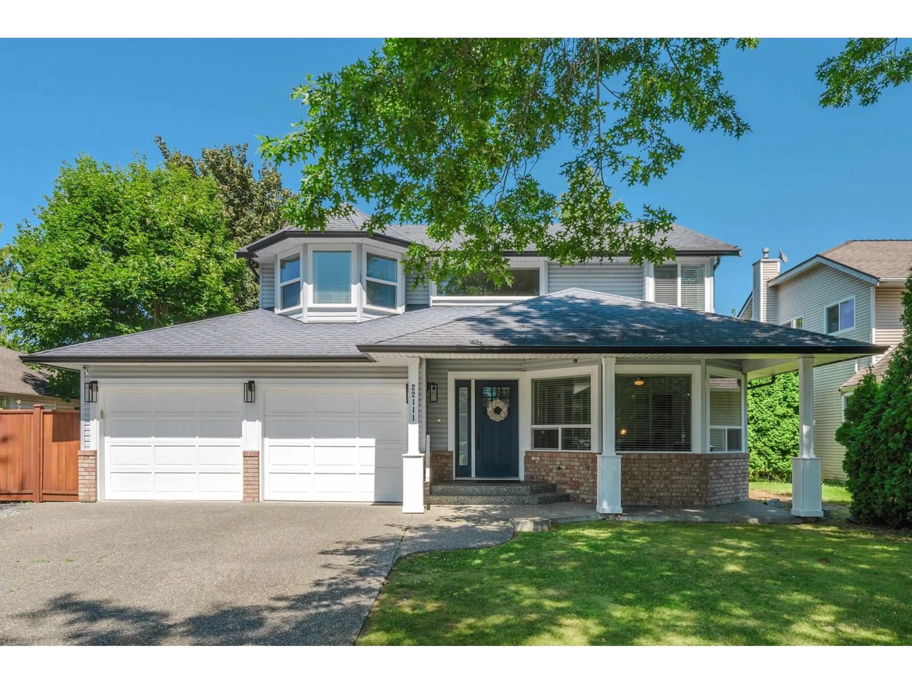 Home with vinyl exterior material, street for 22111 46, Langley British Columbia V2Z1A4