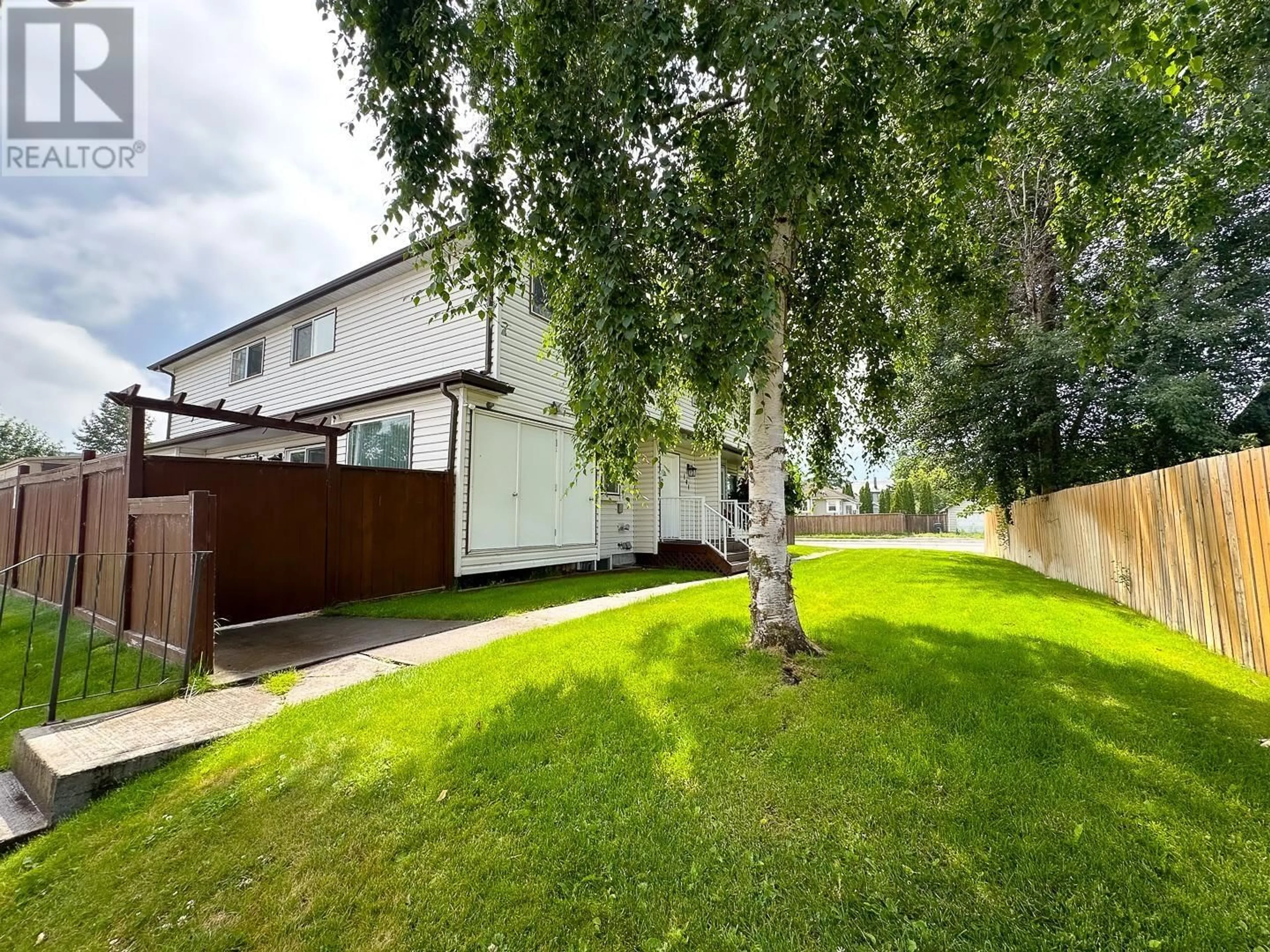 A pic from outside/outdoor area/front of a property/back of a property/a pic from drone, street for 101 - 1930 4TH AVENUE, Prince George British Columbia V2M7B2