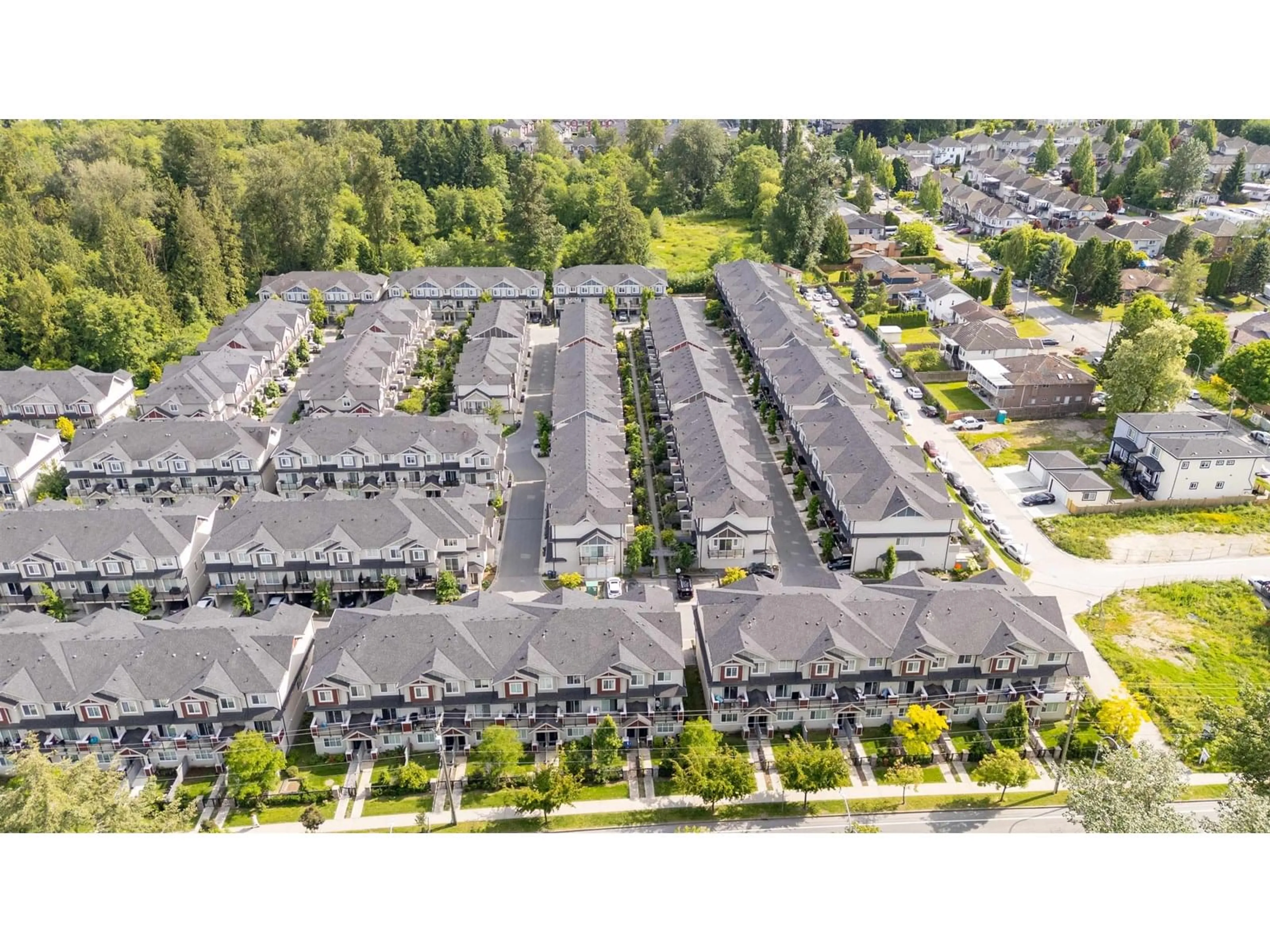 A pic from outside/outdoor area/front of a property/back of a property/a pic from drone, street for 20 - 13898 64, Surrey British Columbia V3W1L6
