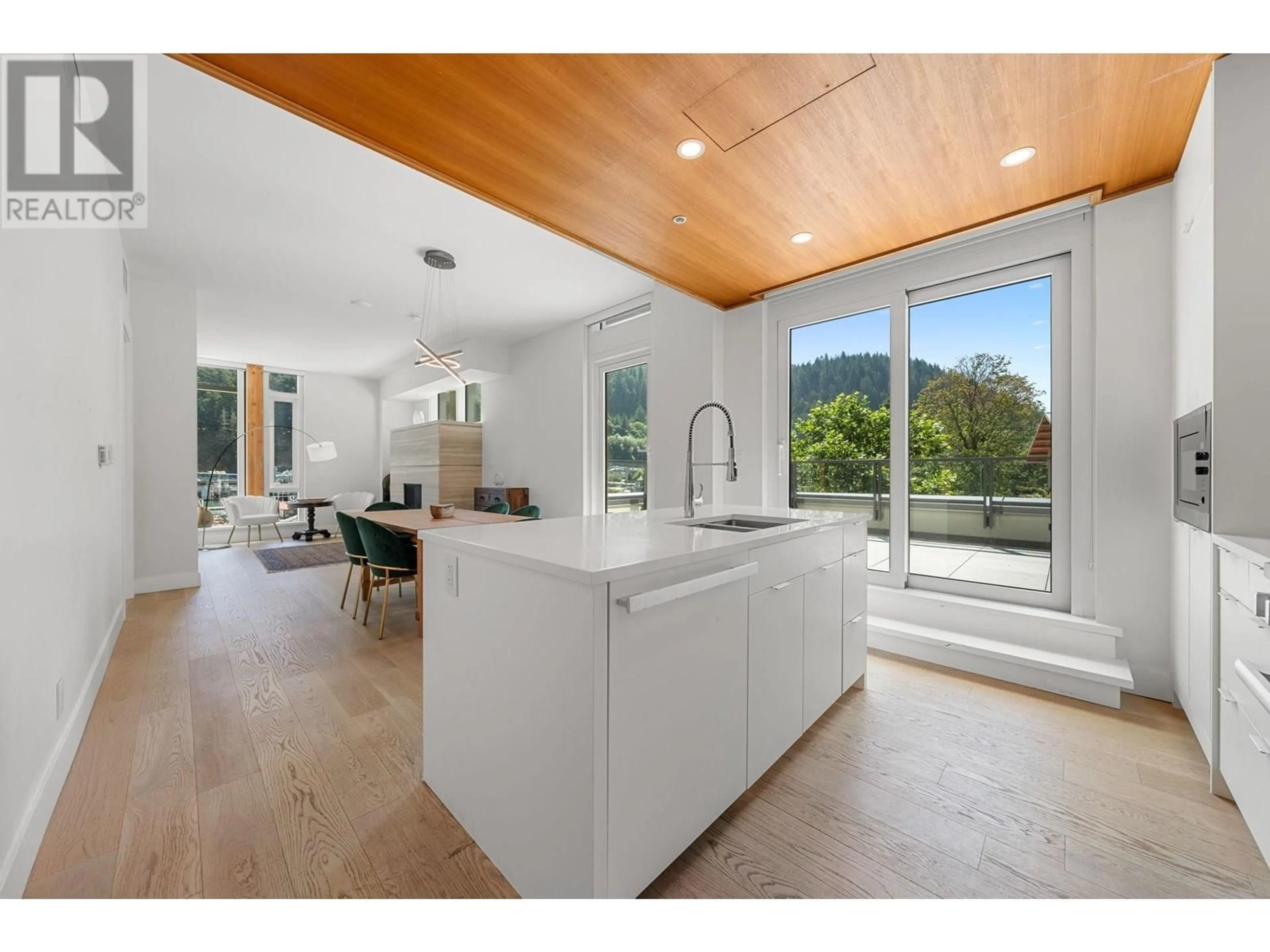 Open concept kitchen, unknown for 309 - 6707 NELSON AVENUE, West Vancouver British Columbia V7W0A4